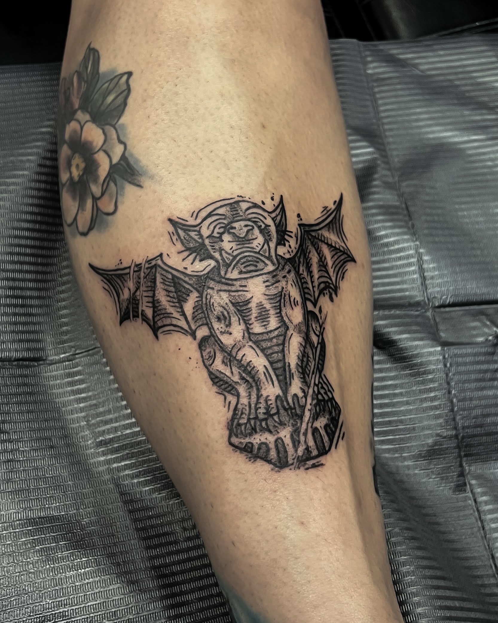Batman black and grey tattoo on the forearm by Morgan Diann