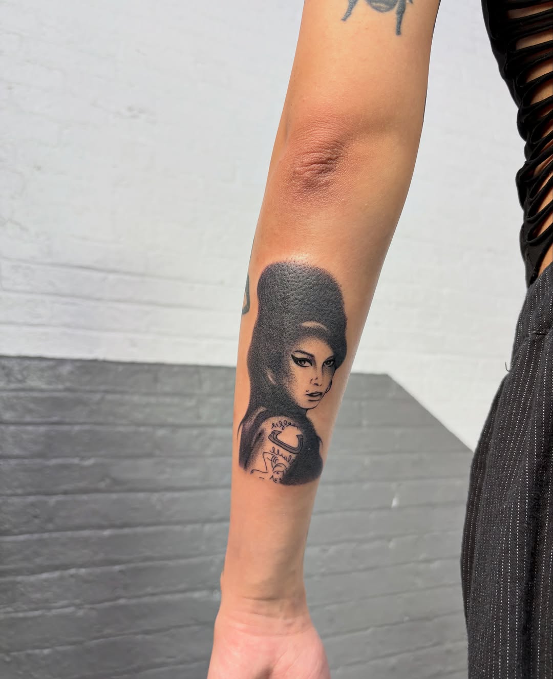 Portrait of Amy Winehouse realism tattoo on the forearm by carly ✭ jordyn