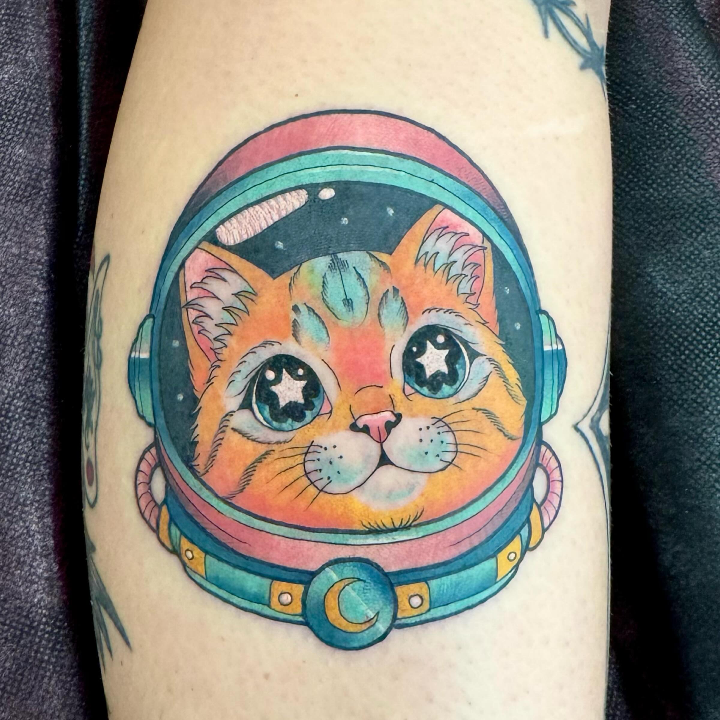 Cat astronaut new school tattoo on the thigh by Samantha Jane