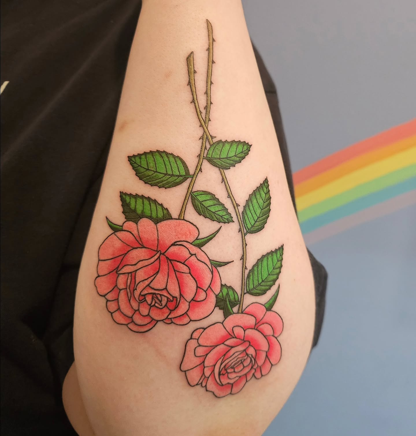 Roses realism tattoo on the forearm by Gray