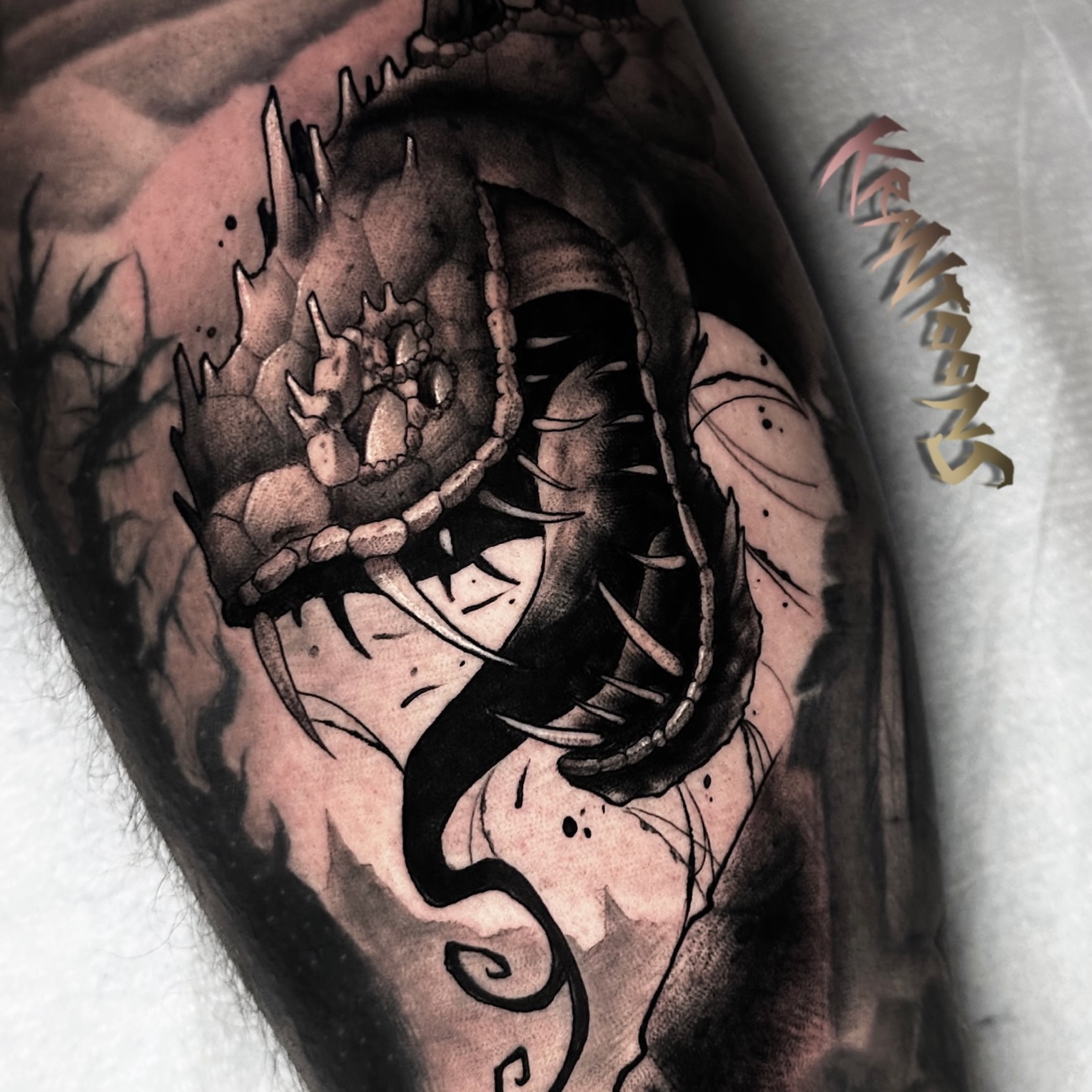 Dragon dark realism tattoo on the forearm by Jason
