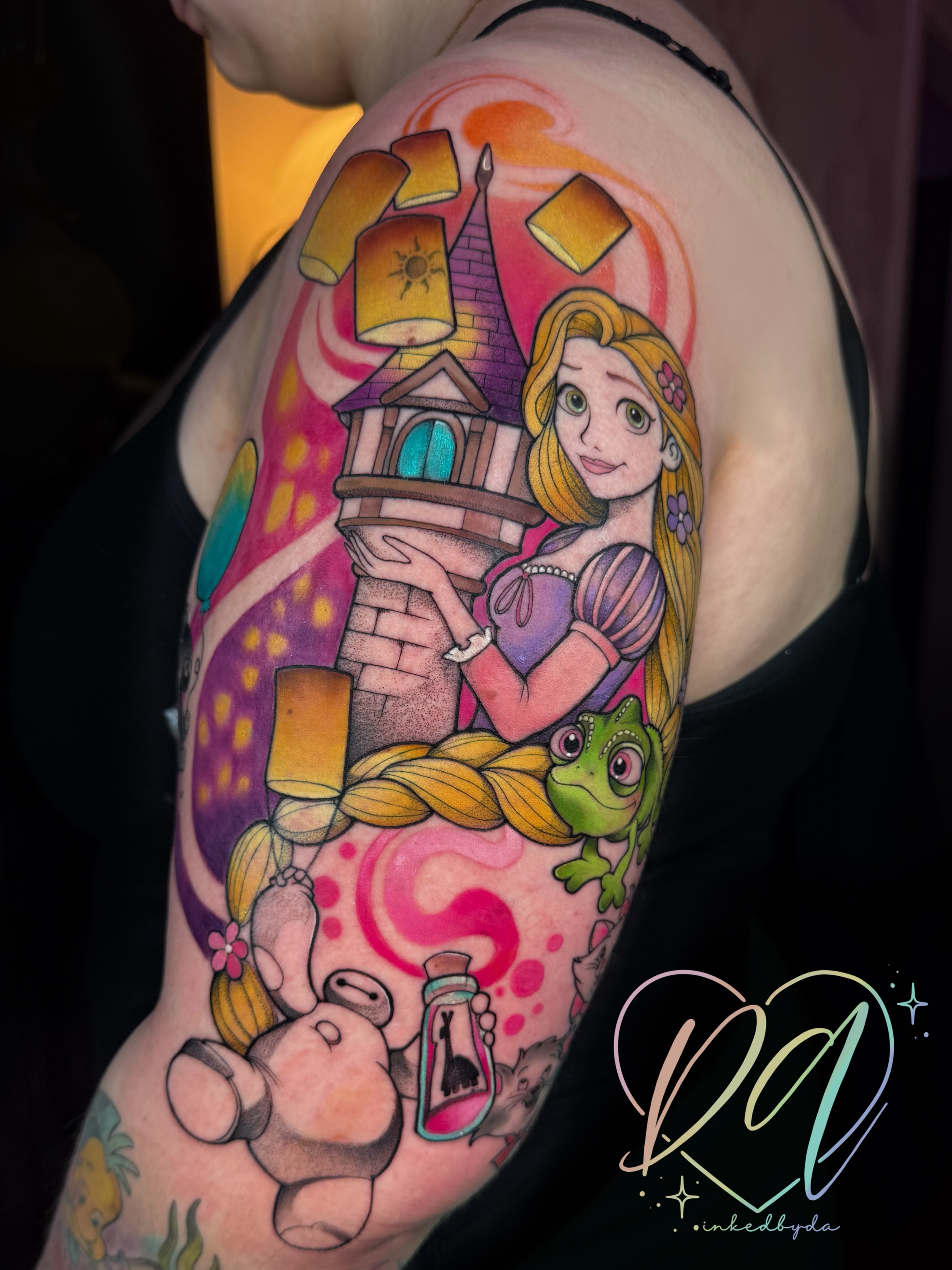 Tangled characters illustrative tattoo on the upper arm by Dalton Alexandria