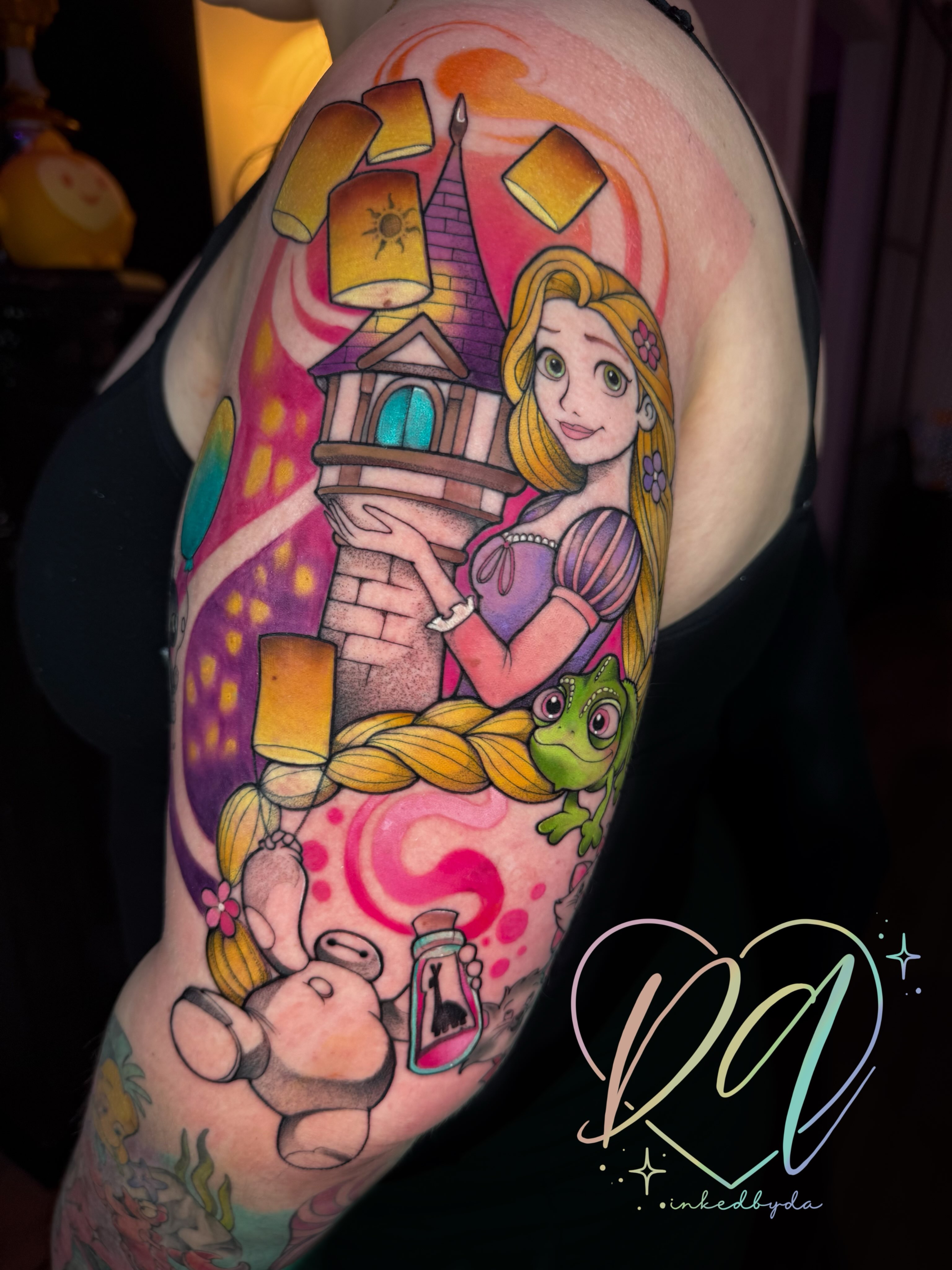 Tangled characters illustrative tattoo on the upper arm by Dalton Alexandria