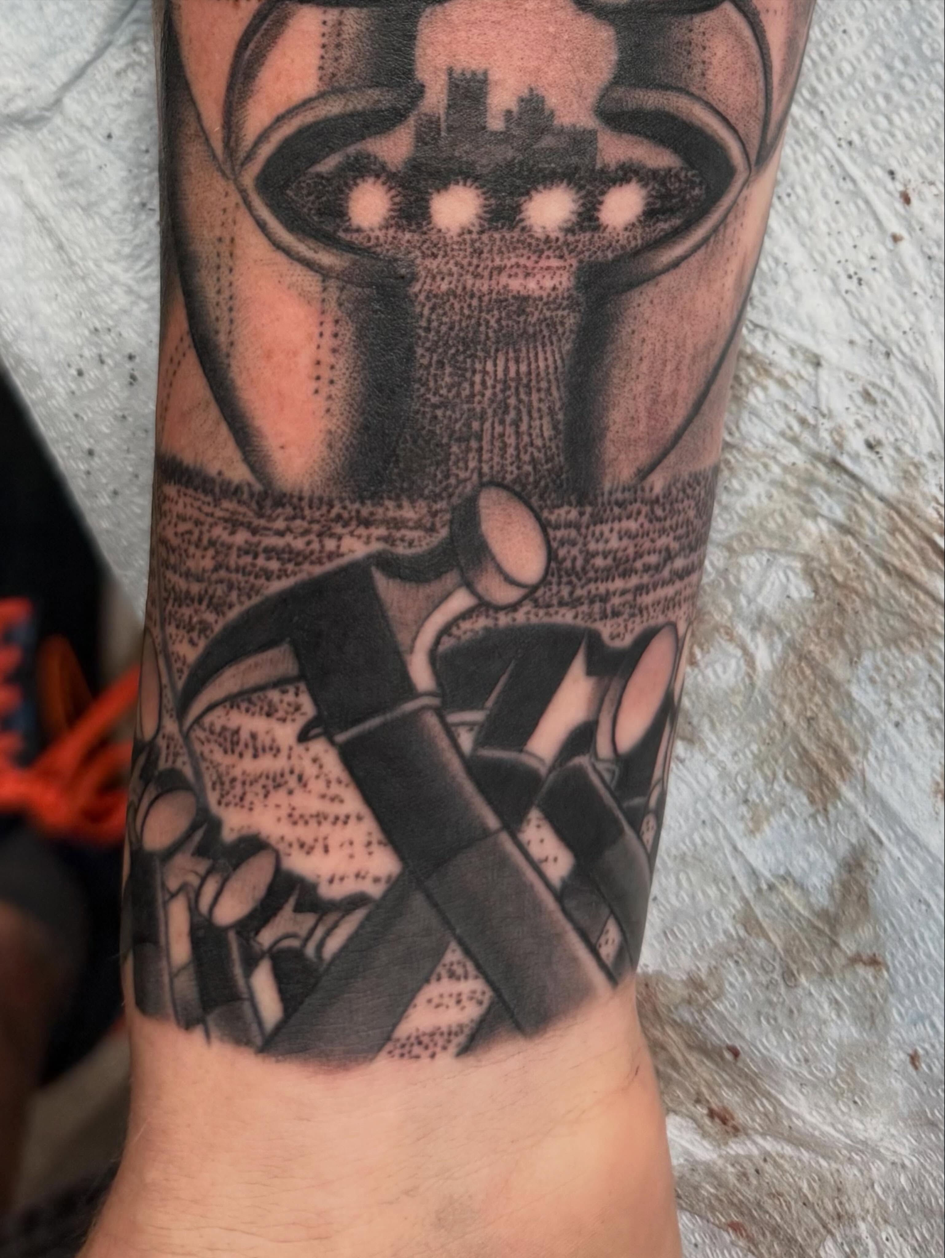 Cityscape dotwork tattoo on the forearm by Hori Bensei, Charlottesville, Virginia