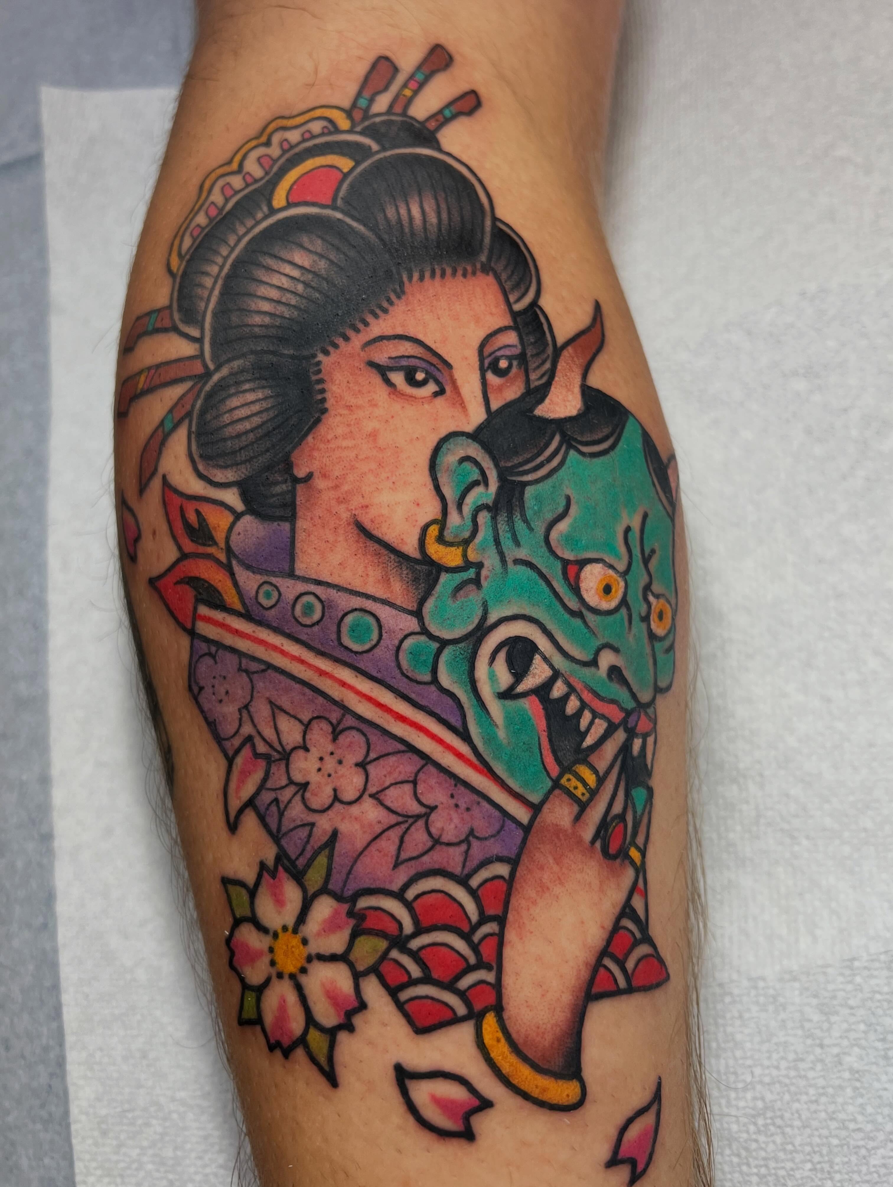 Geisha and dragon American traditional tattoo on the forearm by Mat Helton, Fairborn, Ohio
