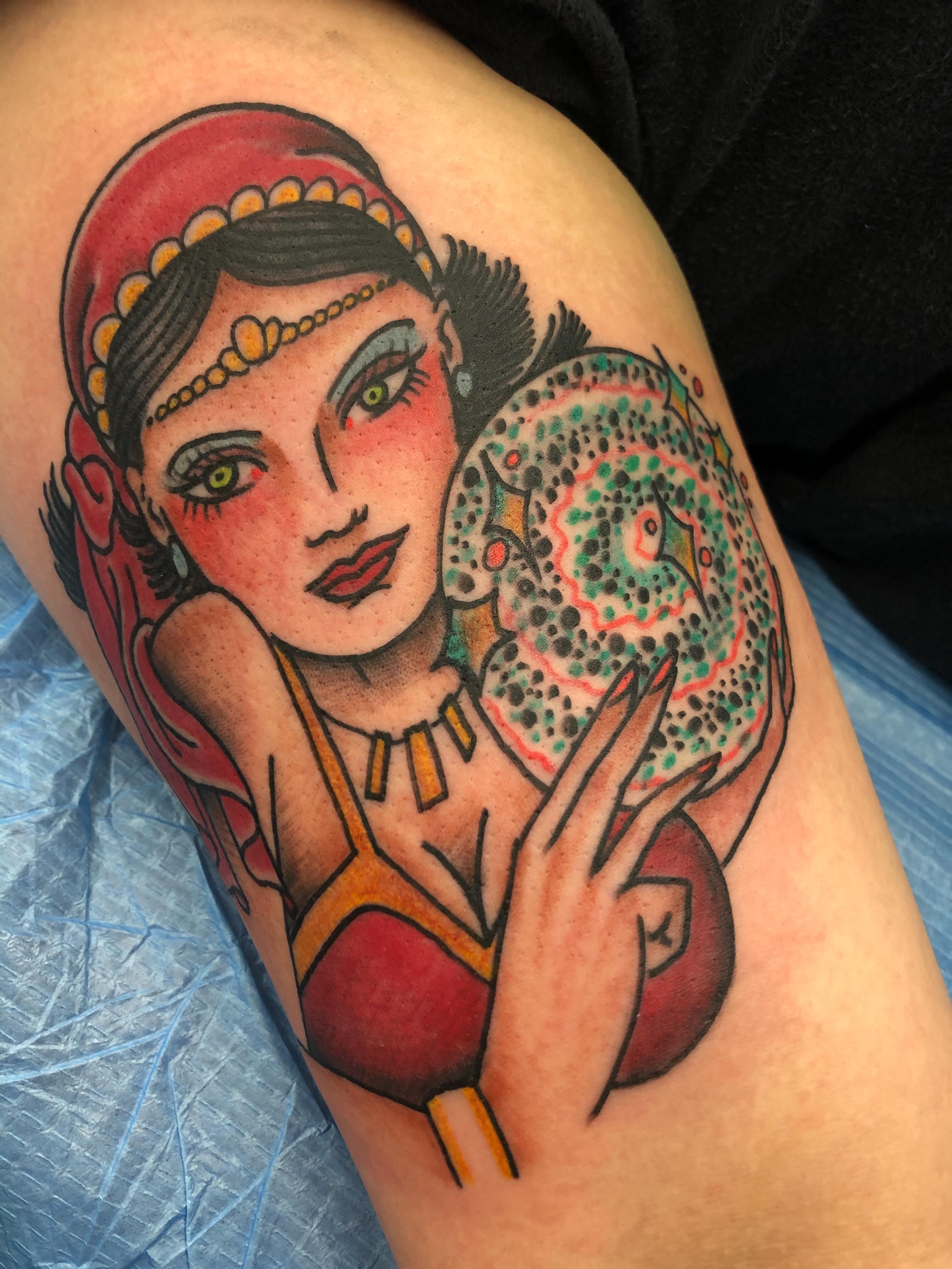 Woman with crystal ball American traditional tattoo on the forearm by Mat Helton, Fairborn, Ohio