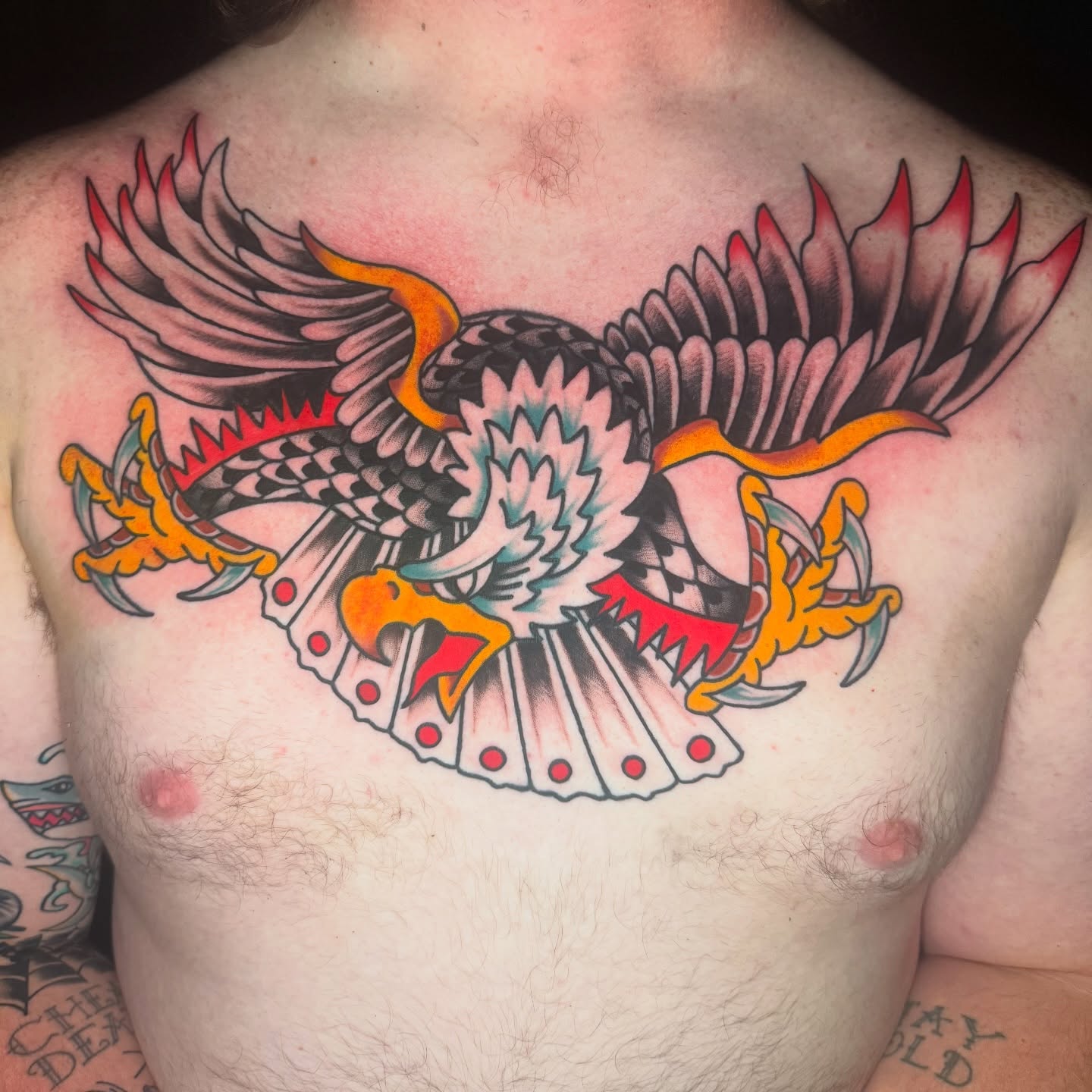 Eagle American traditional tattoo on the chest by Kenneth Gibson