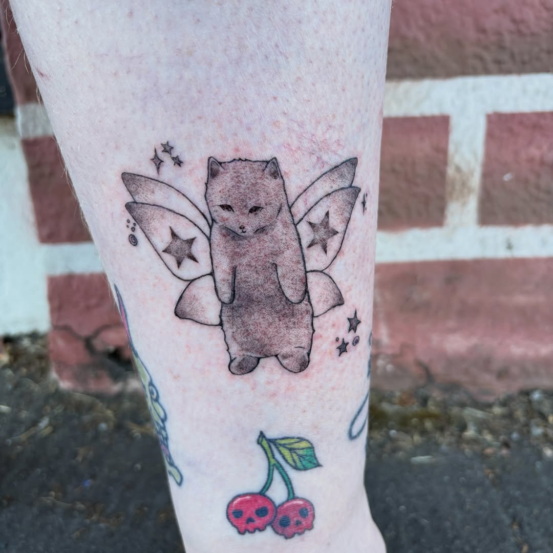 Cat fairy dotwork tattoo on the forearm by izzy solae