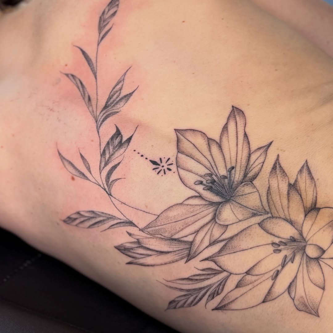 Lilies and leaves dotwork tattoo by Silva Wellen