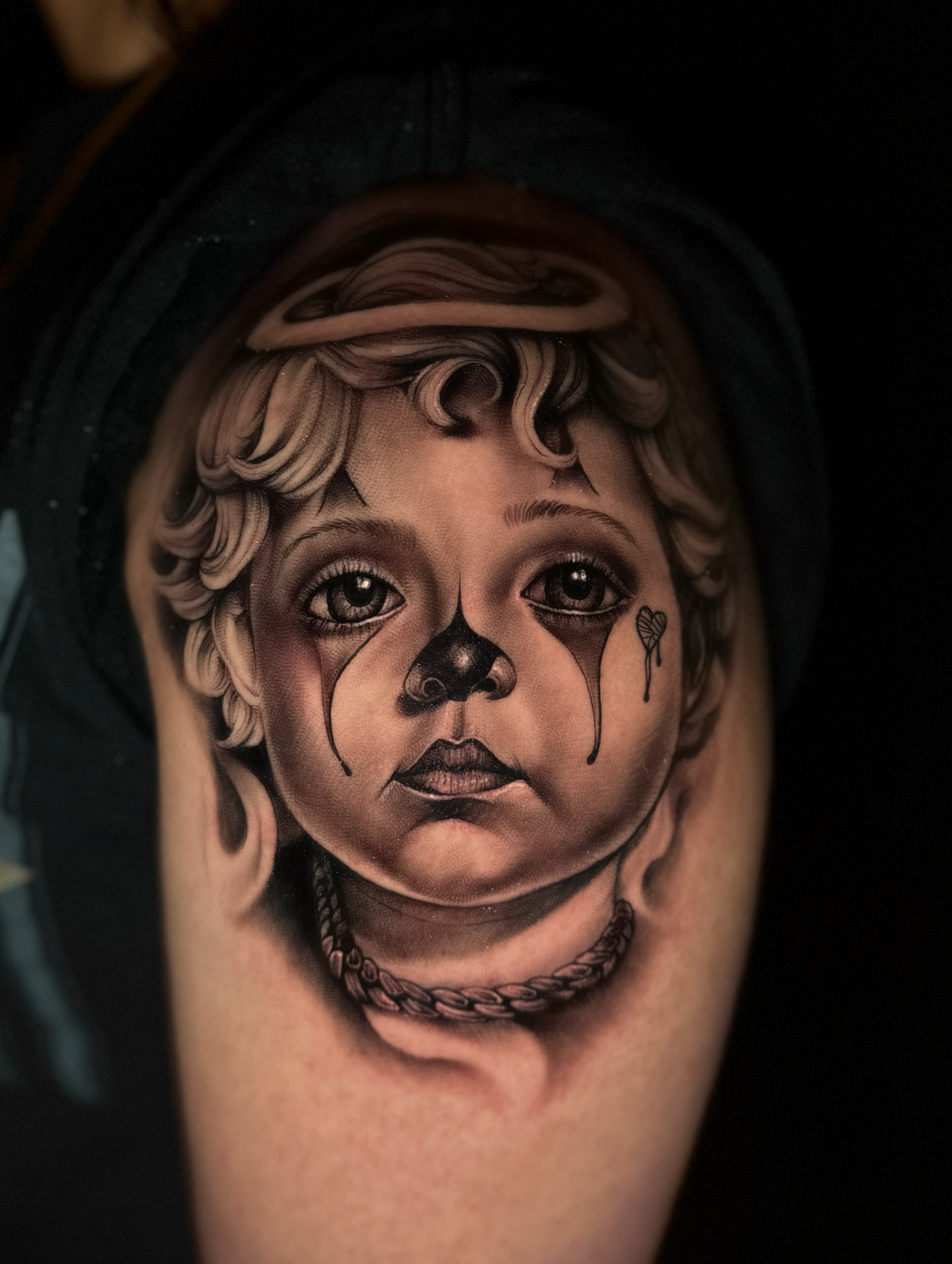 Child's face realism tattoo on the forearm by Georgianna Ink, Las Vegas, Nevada