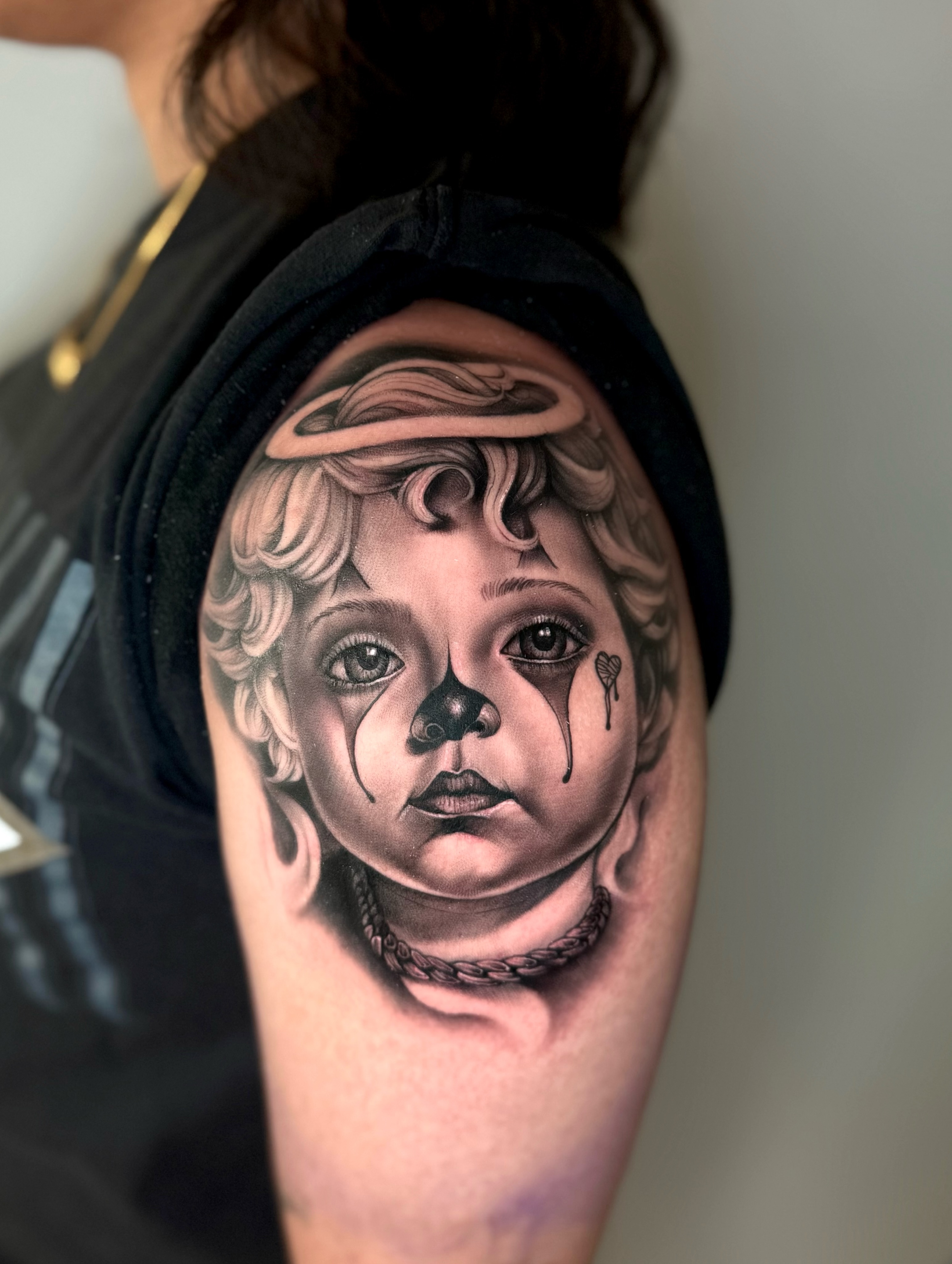 Child angel realism tattoo on the forearm by Georgianna Ink, Las Vegas, Nevada