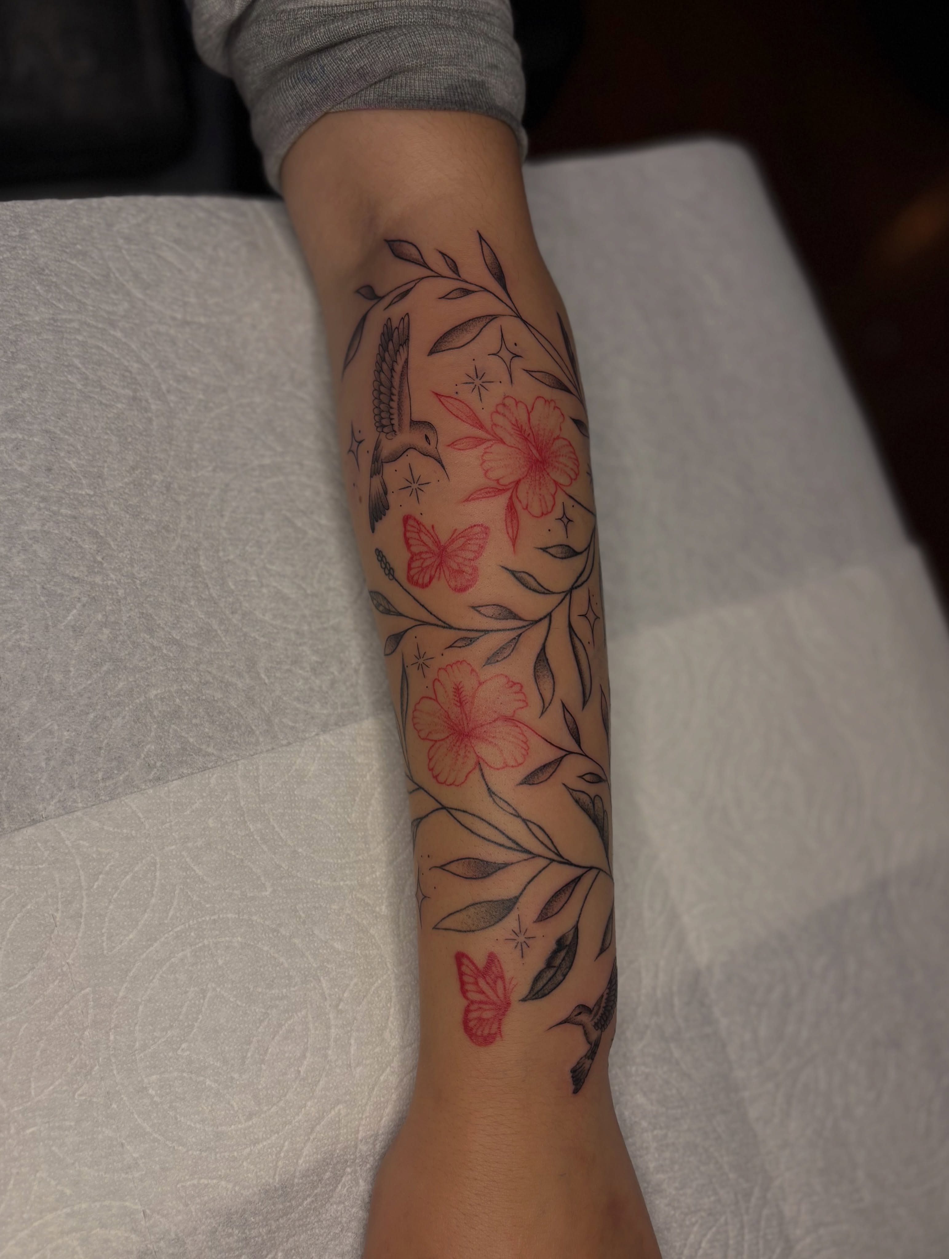 Flowers and birds new school tattoo on the forearm by the ink witch ๐ฎ๐ค๐