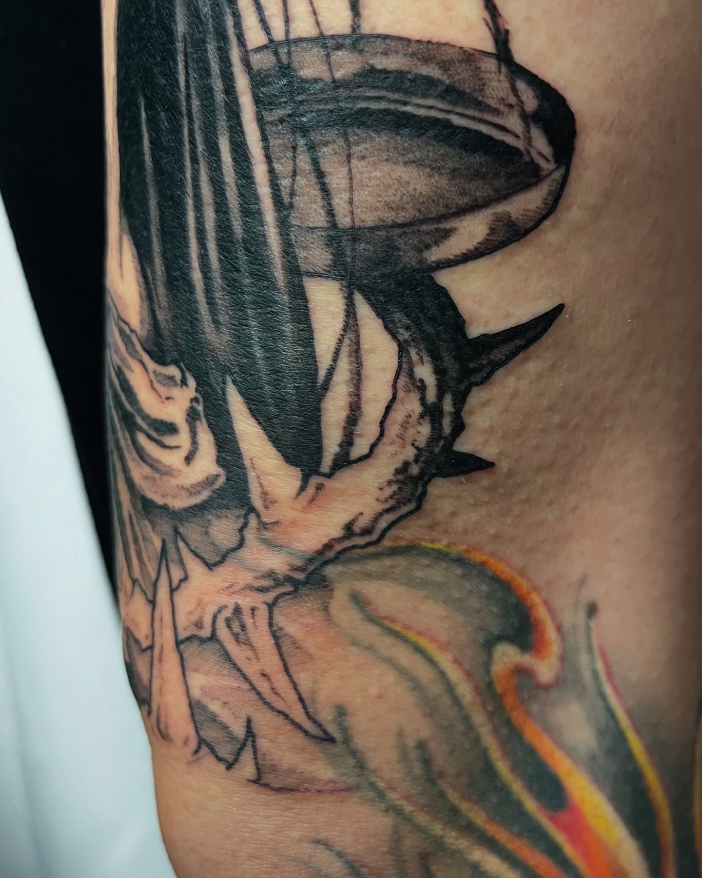 Bat black and grey tattoo on the forearm by Cameron Jenkins