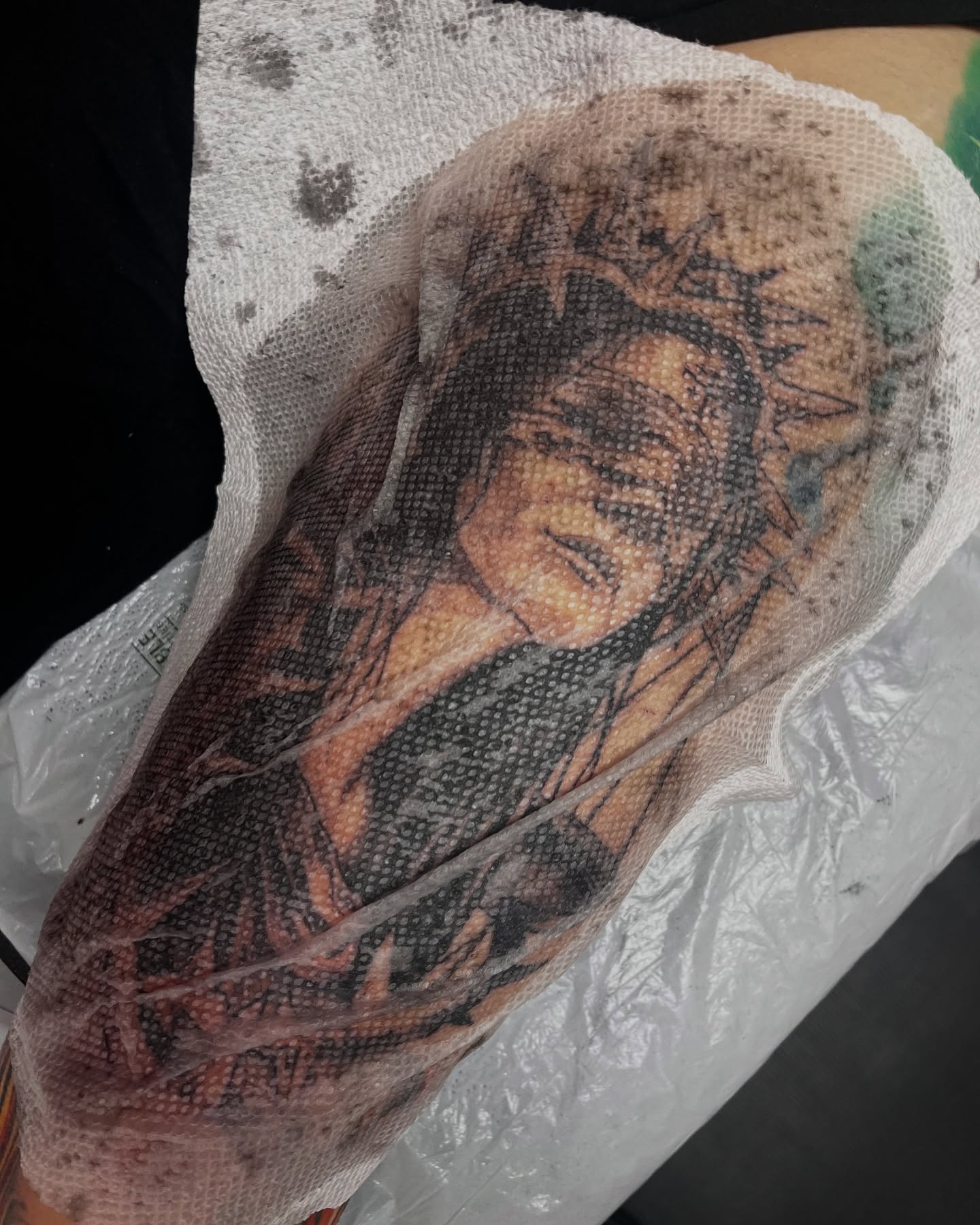 Religious figure dotwork tattoo on the forearm by Cameron Jenkins