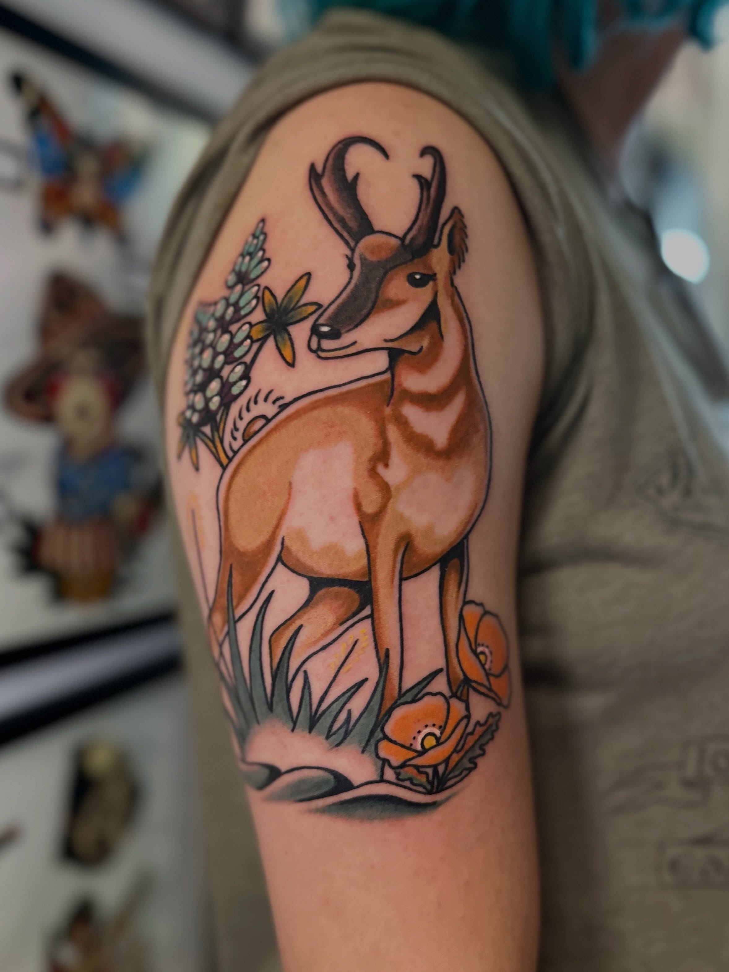 Deer American traditional tattoo on the upper arm by Nick Weaver aka gibby sometimes gilbert
