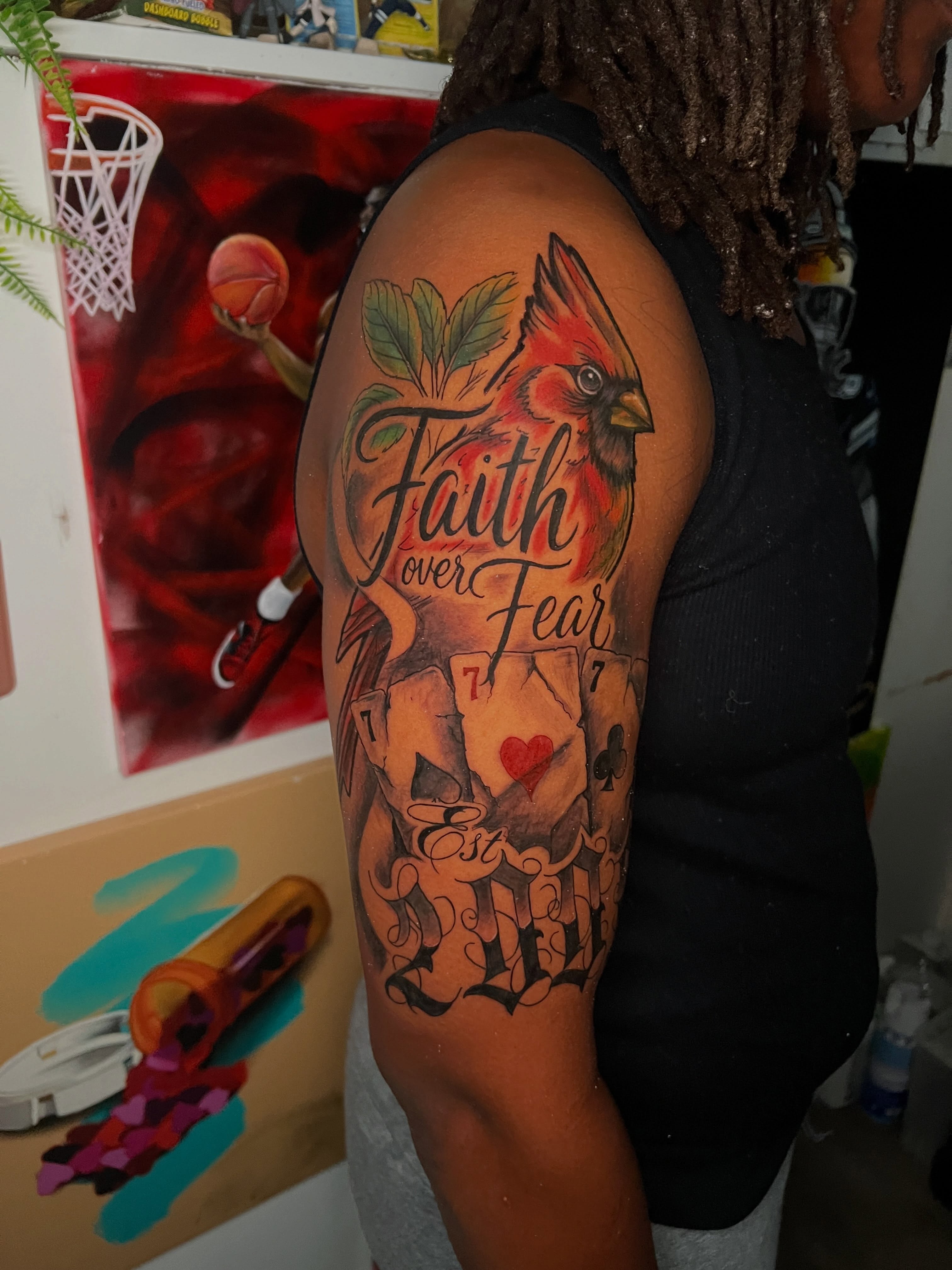 Cardinal bird and playing cards American traditional tattoo on the thigh by Justx4rt