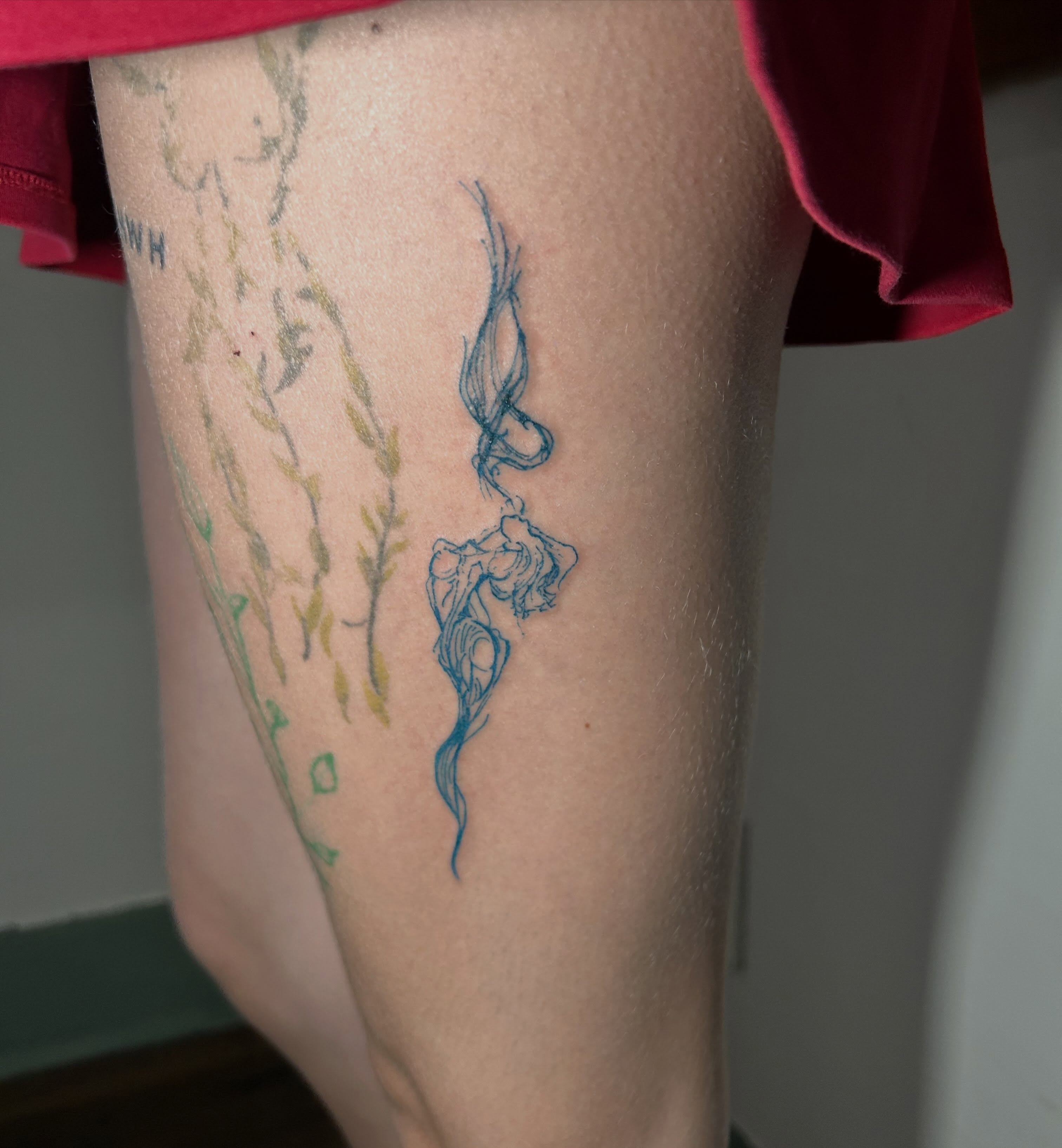 Mermaid new school tattoo on the thigh by Miss Katie