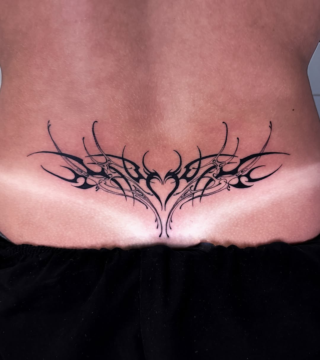 Tribal heart tribal tattoo on the torso by 𝕮𝖞𝖇𝖊𝖗𝕾𝖎𝖌𝖎𝖑𝖎𝖘𝖒