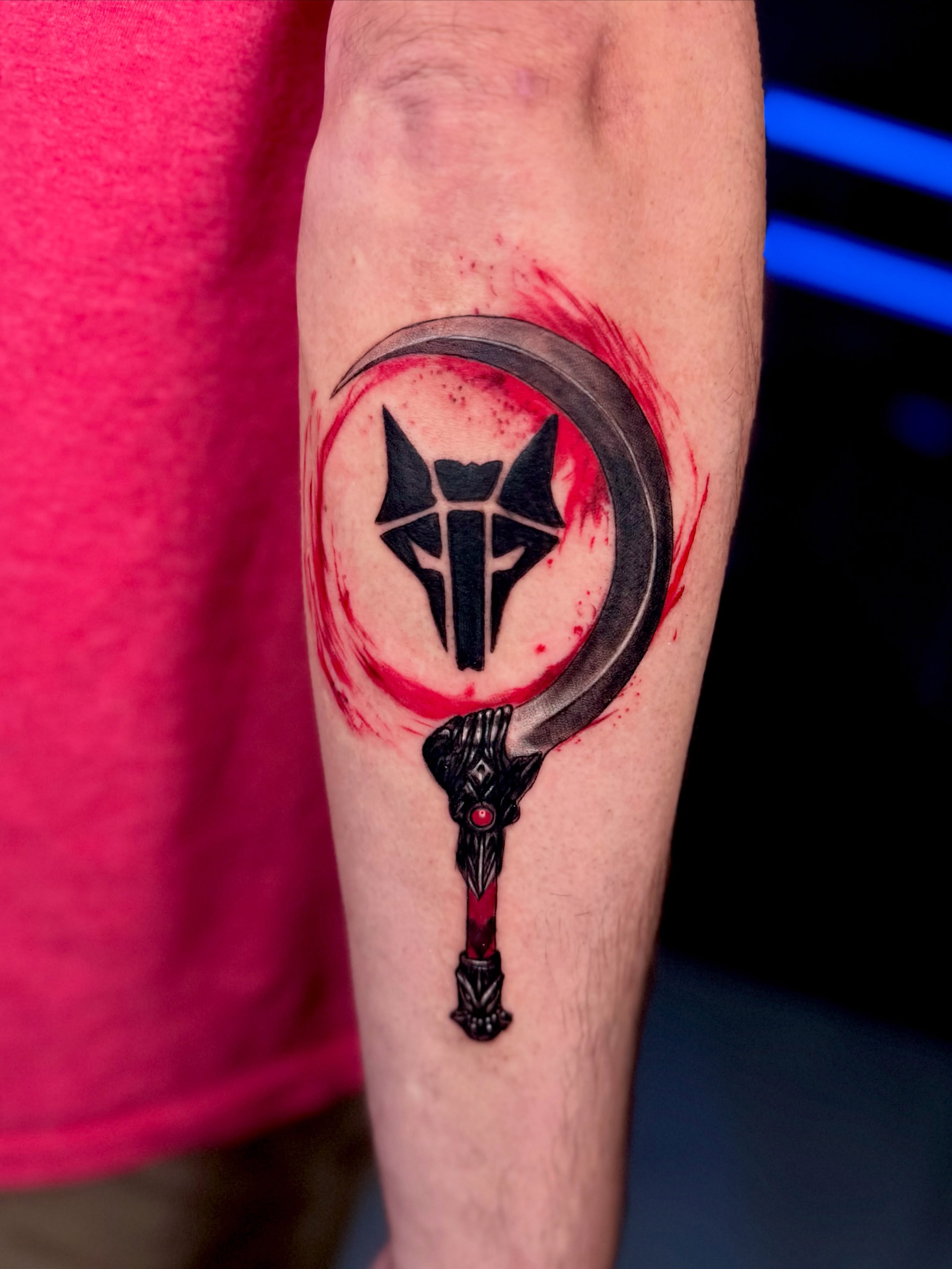Wolf mask and crescent moon geometric tattoo on the forearm by Idalia Pulido
