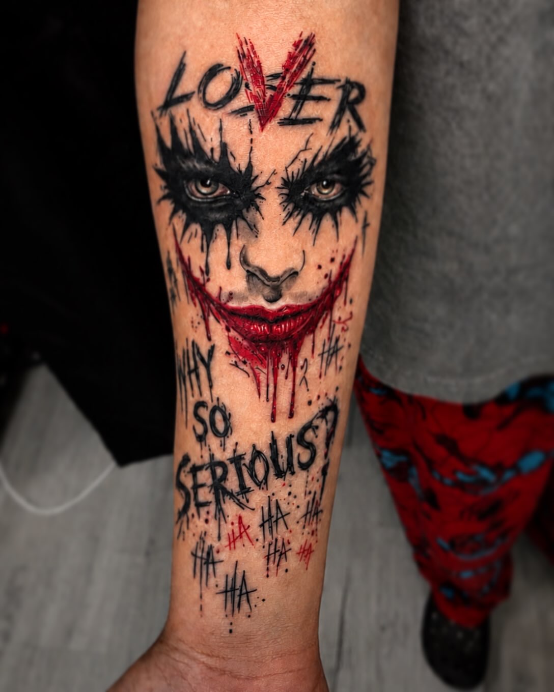 Joker dark realism tattoo on the forearm by Yayo, New Britain, Connecticut