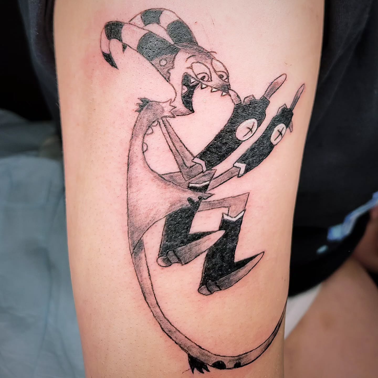 Cheshire cat black and grey tattoo on the thigh by Bee