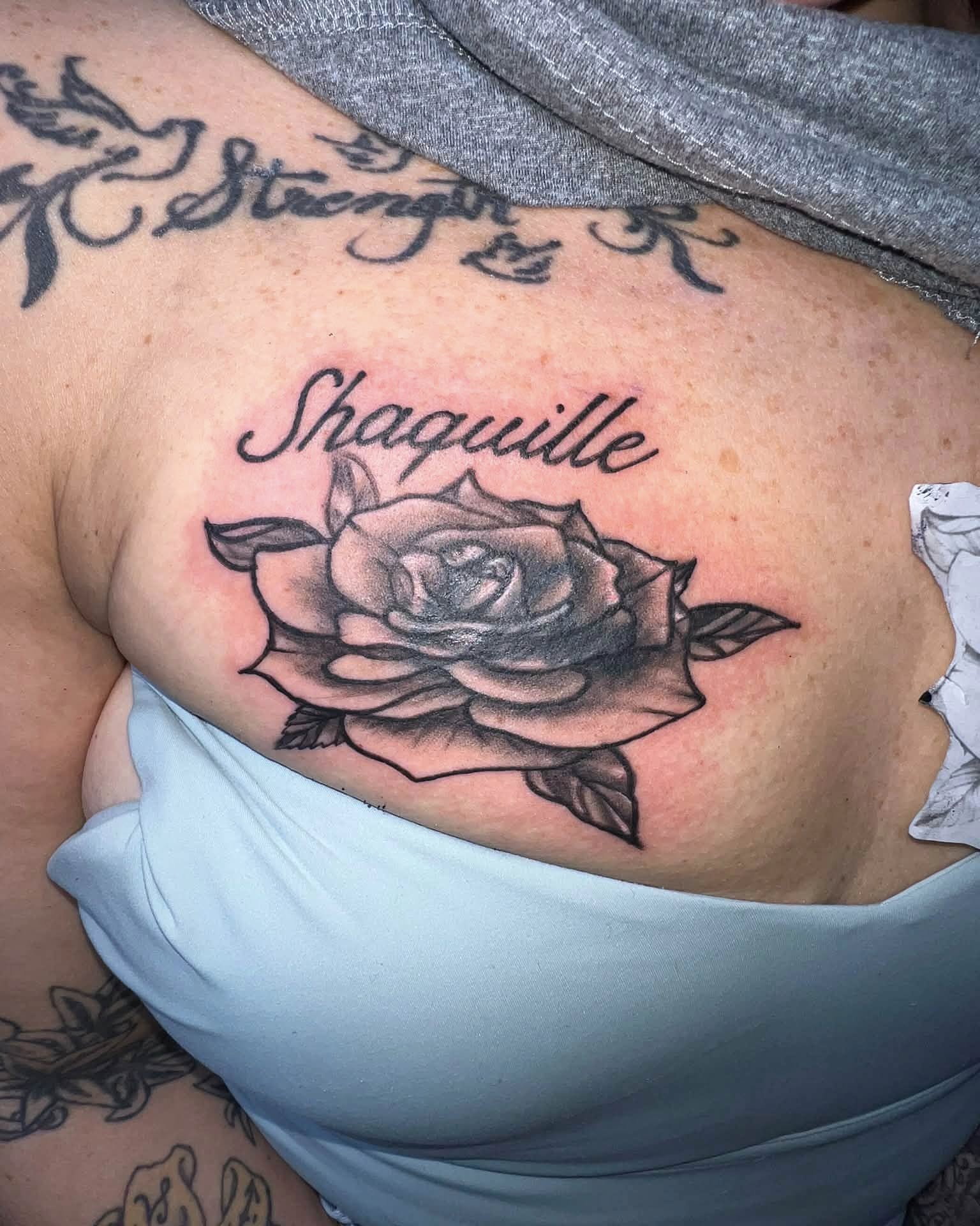 Rose black and grey tattoo on the ribs by Don Juan Ink Therapy, Jamesburg, New Jersey