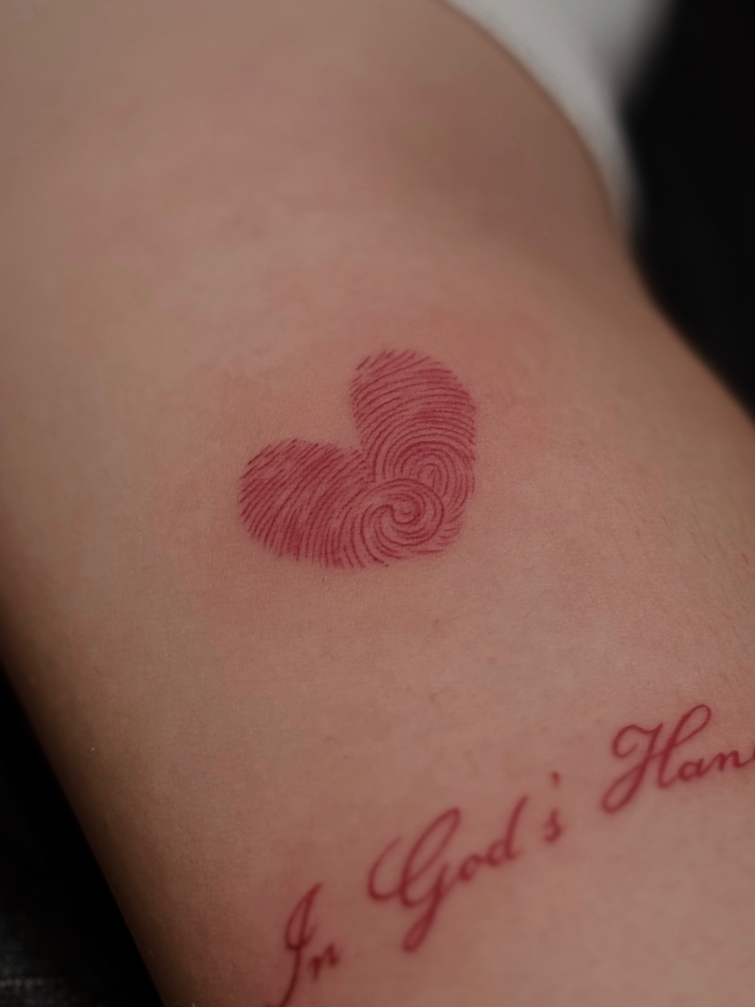Fingerprint heart dotwork tattoo on the forearm by Daria