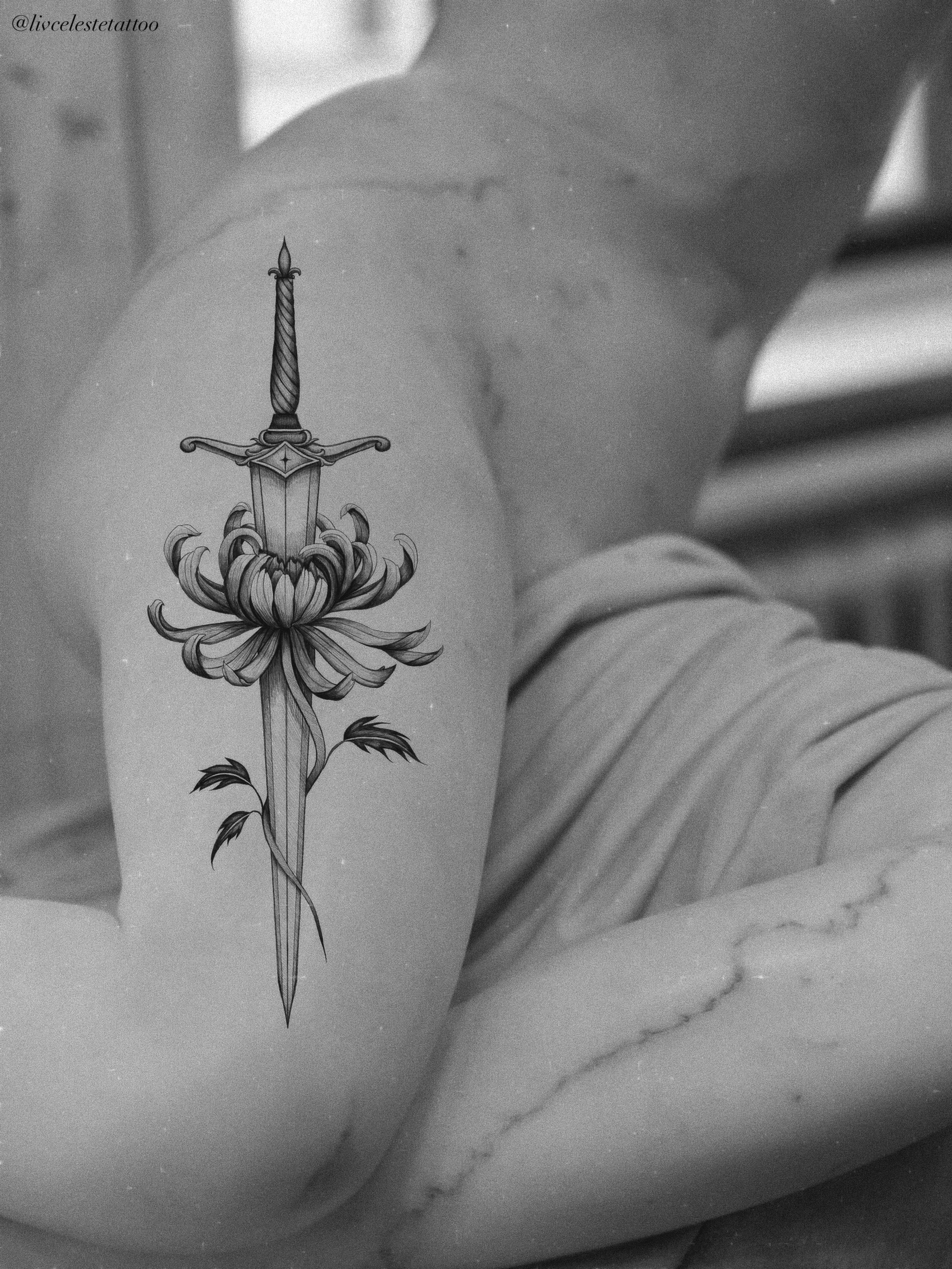Sword and flower ornamental tattoo on the forearm by ༻❁༺ ⟡ 𝑳𝒊𝒗 𝑪𝒆𝒍𝒆𝒔𝒕𝒆 ⟡ ༻❁༺
