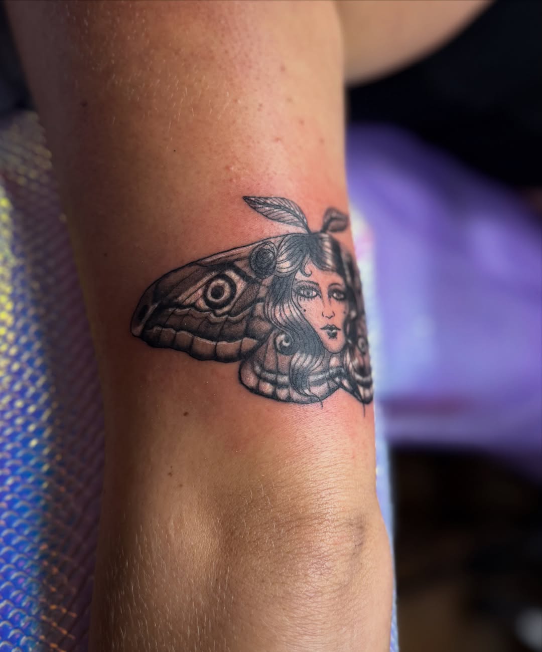 Woman moth realism tattoo on the forearm by KT