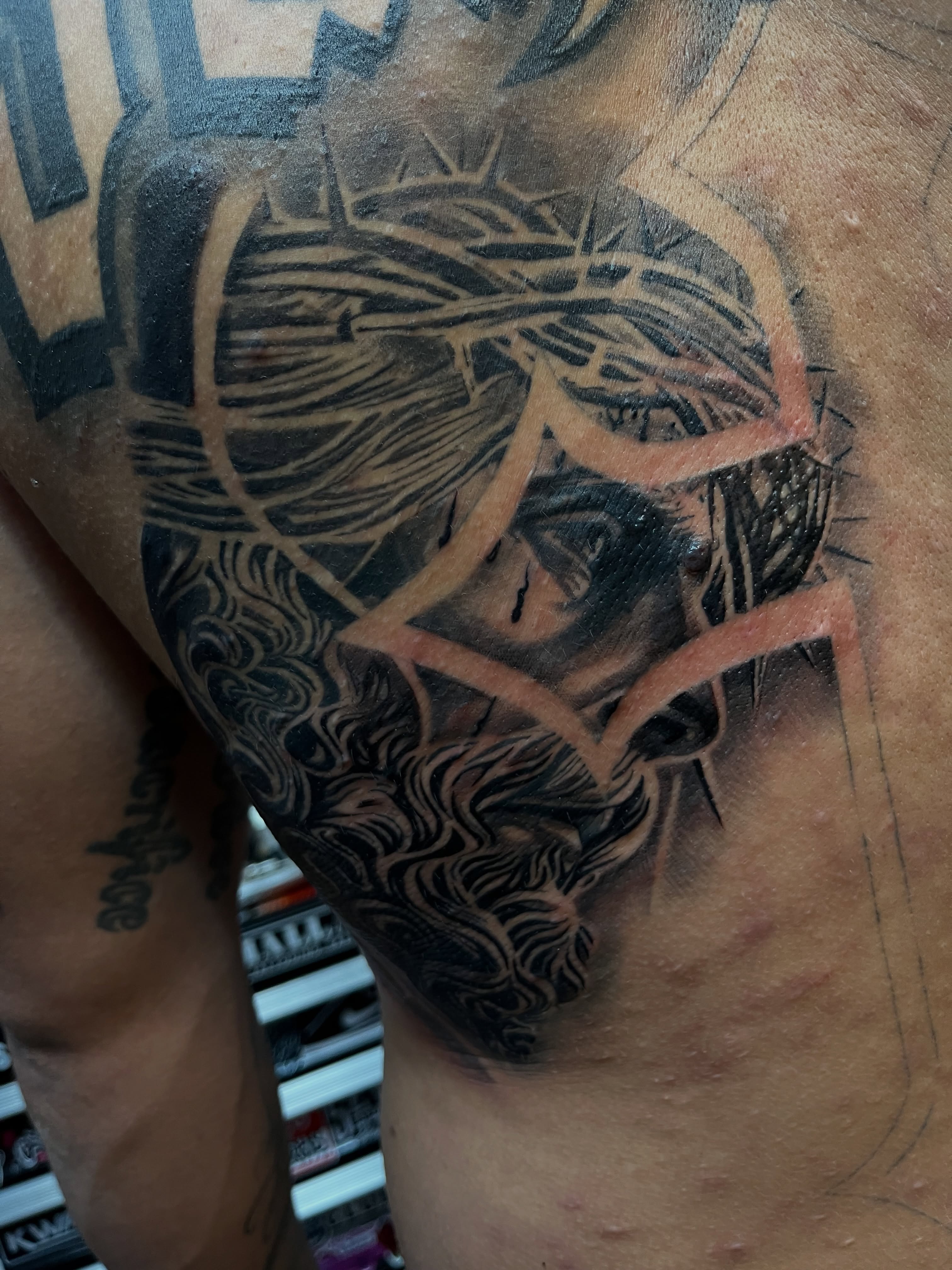 Jeweled crown realism tattoo on the chest by Kwete Tatuajes