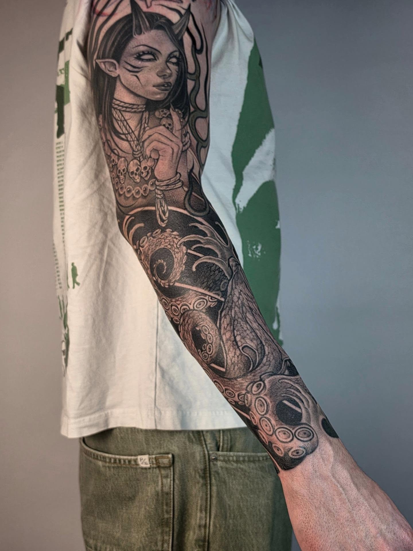 Woman with dragon realism tattoo on the forearm by Tattoos.byDahlia, Austin, Texas