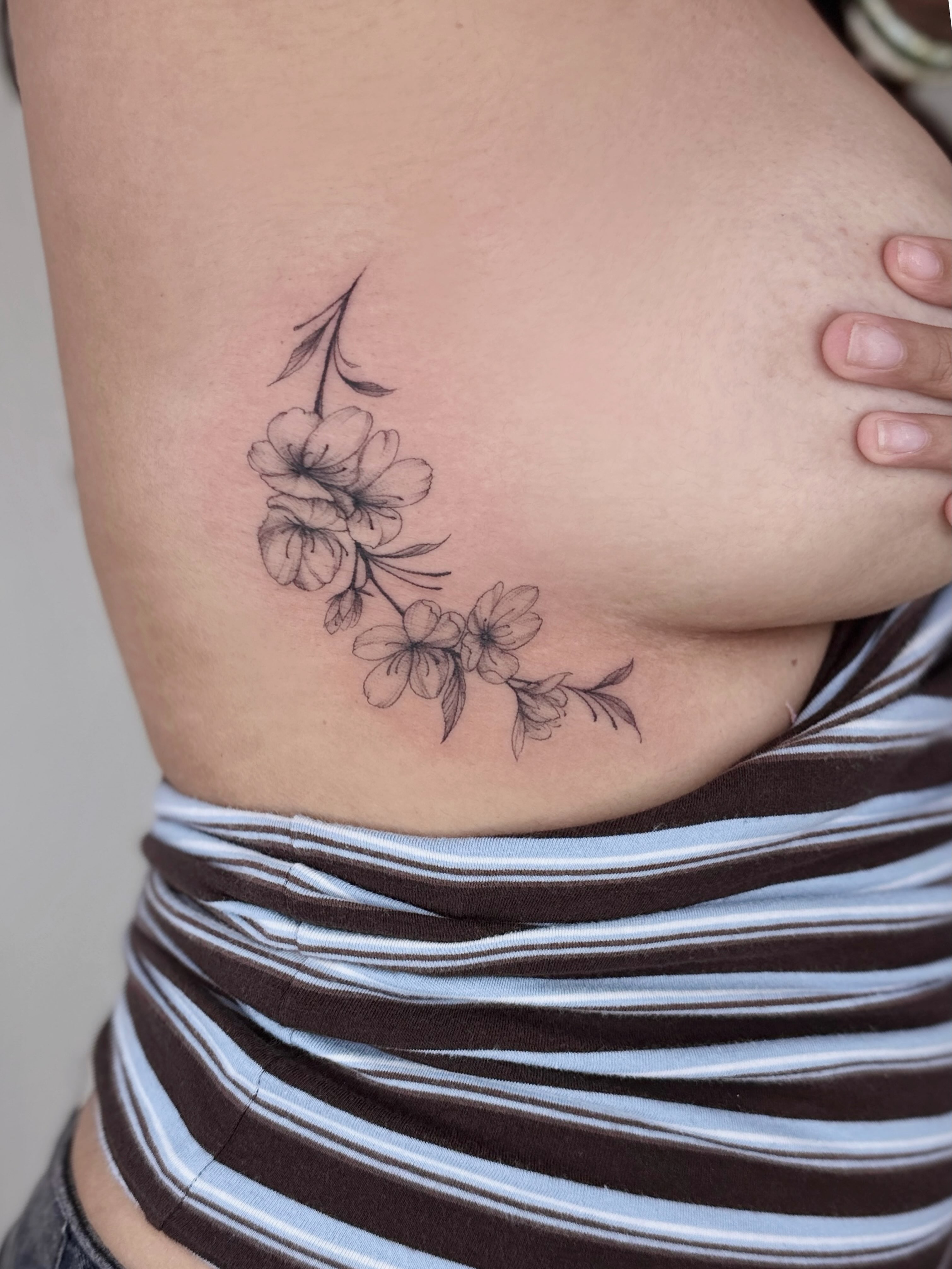 Cherry blossoms black and grey tattoo on the ribs by ๐๐๐๐ ๐๐๐๐๐๐ ๐๐๐๐๐