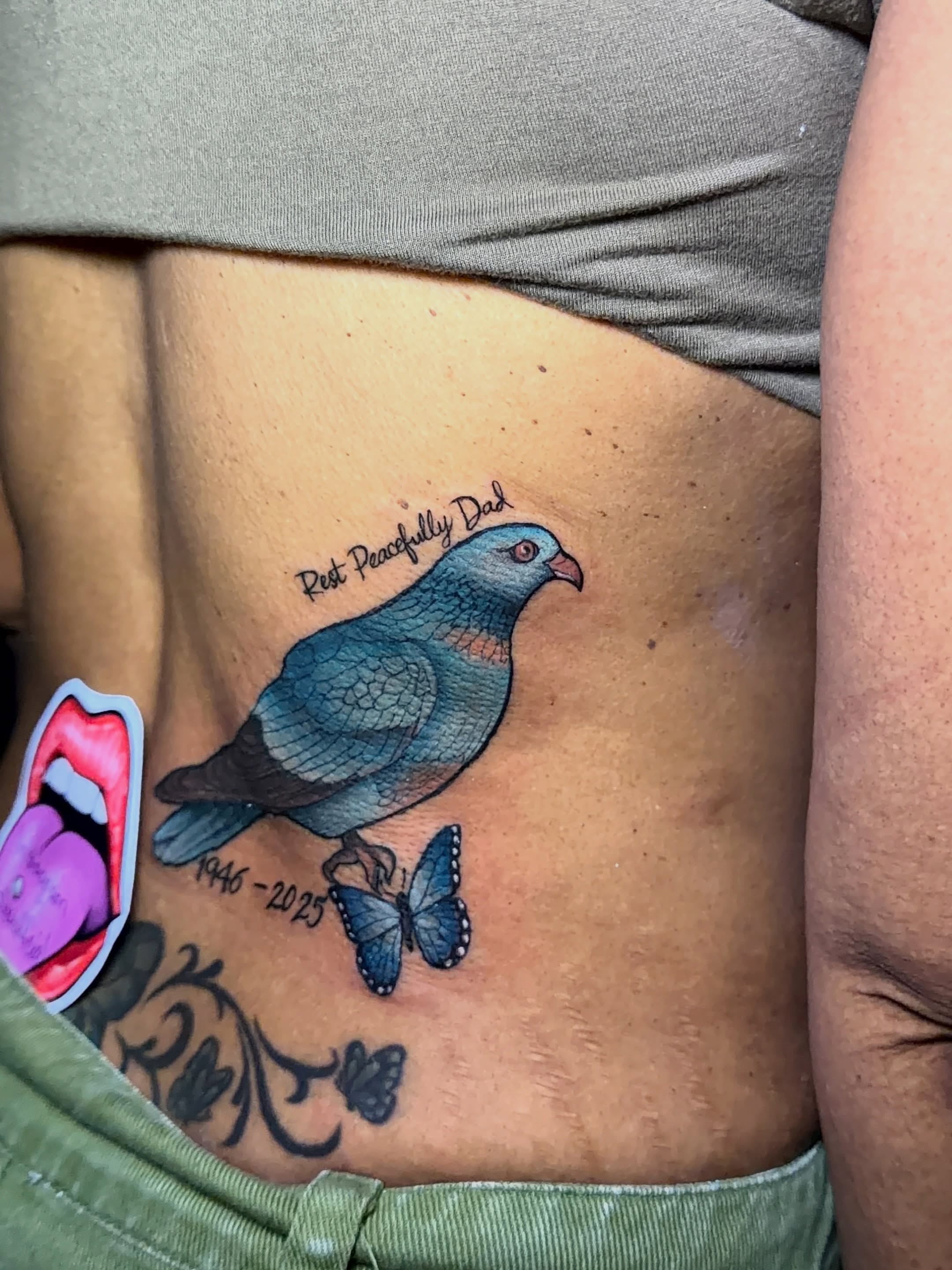 Bird and butterfly American traditional tattoo on the ribs by Doll The Tattoo Artist, Addison, Texas