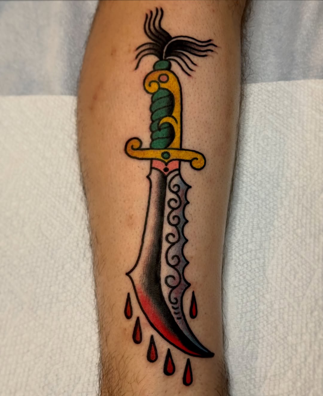 Sword American traditional tattoo on the forearm by Eli Bernal