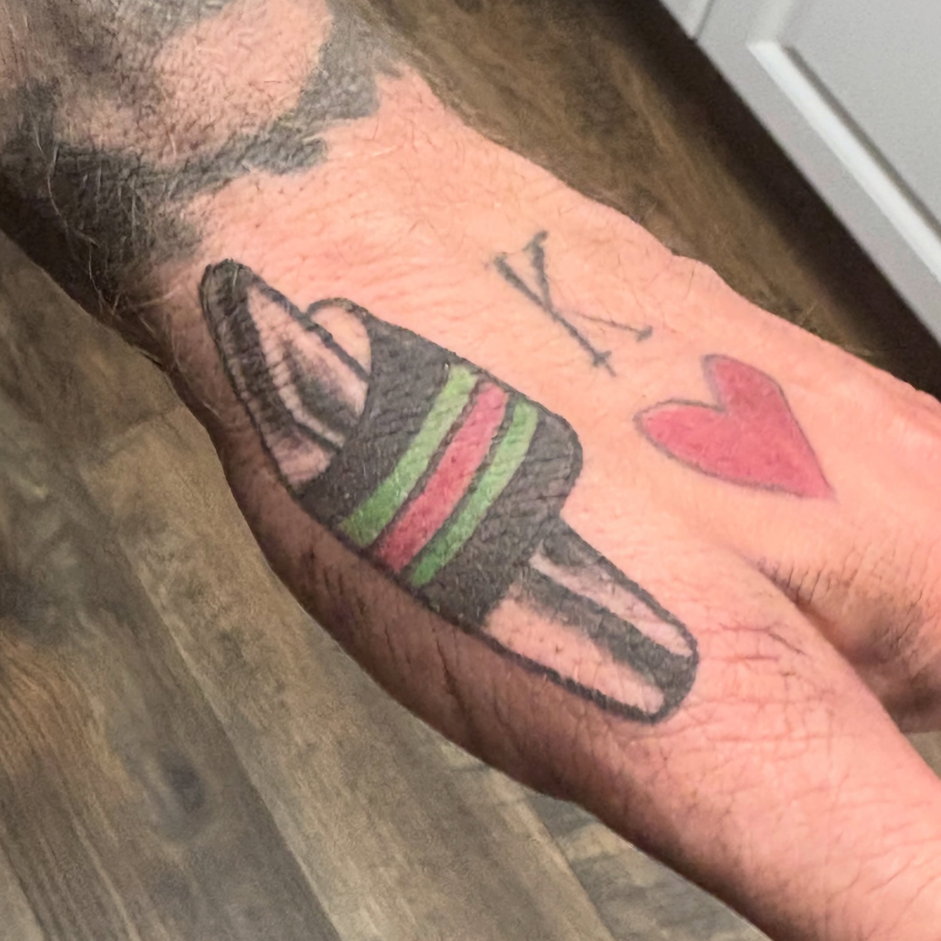 Ice cream cone American traditional tattoo on the forearm by Landon Bagley