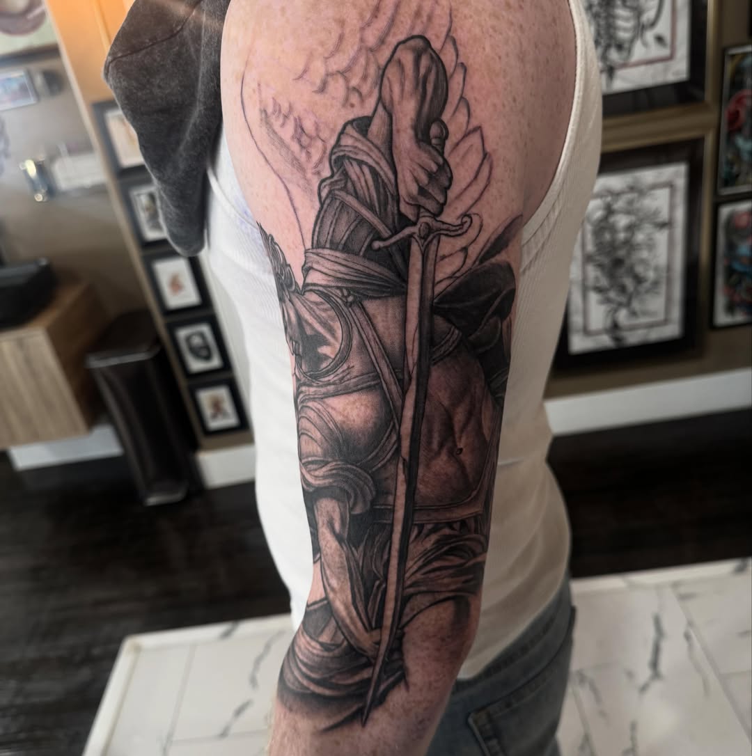 Warrior with sword realism tattoo on the forearm by Keith Smith