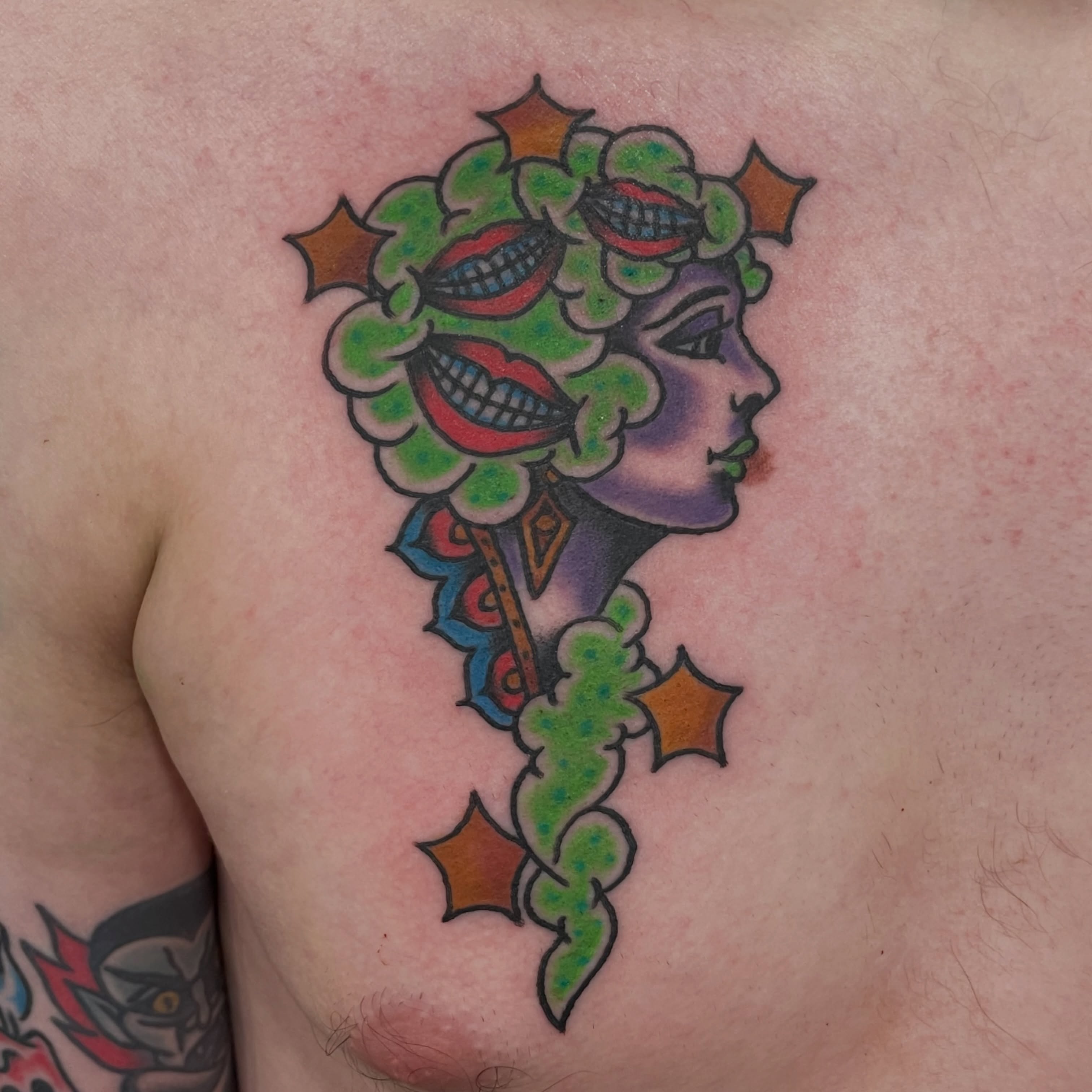 Floral woman American traditional tattoo on the back by Greg De Hoot, Youngsville, North Carolina