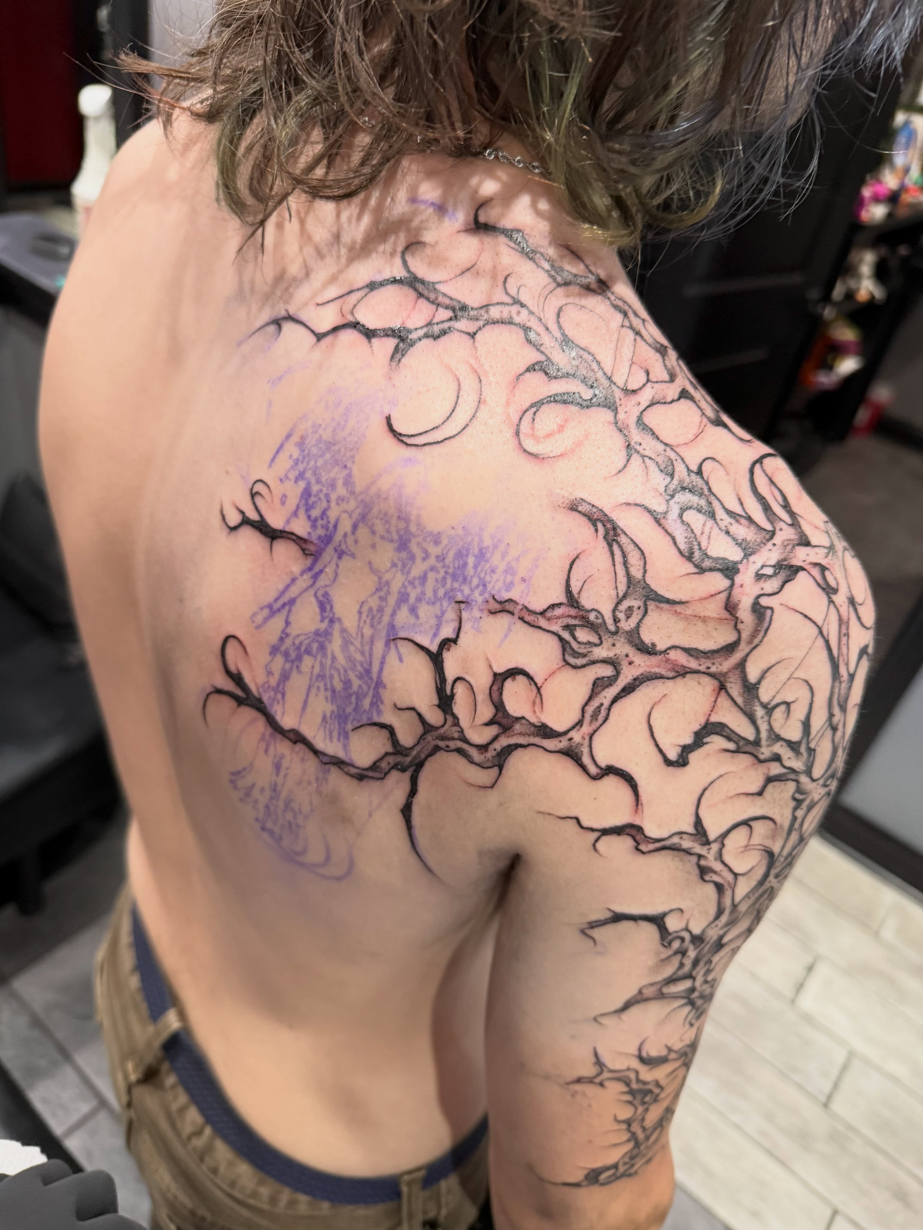 Tree black and grey tattoo on the back by Courtney