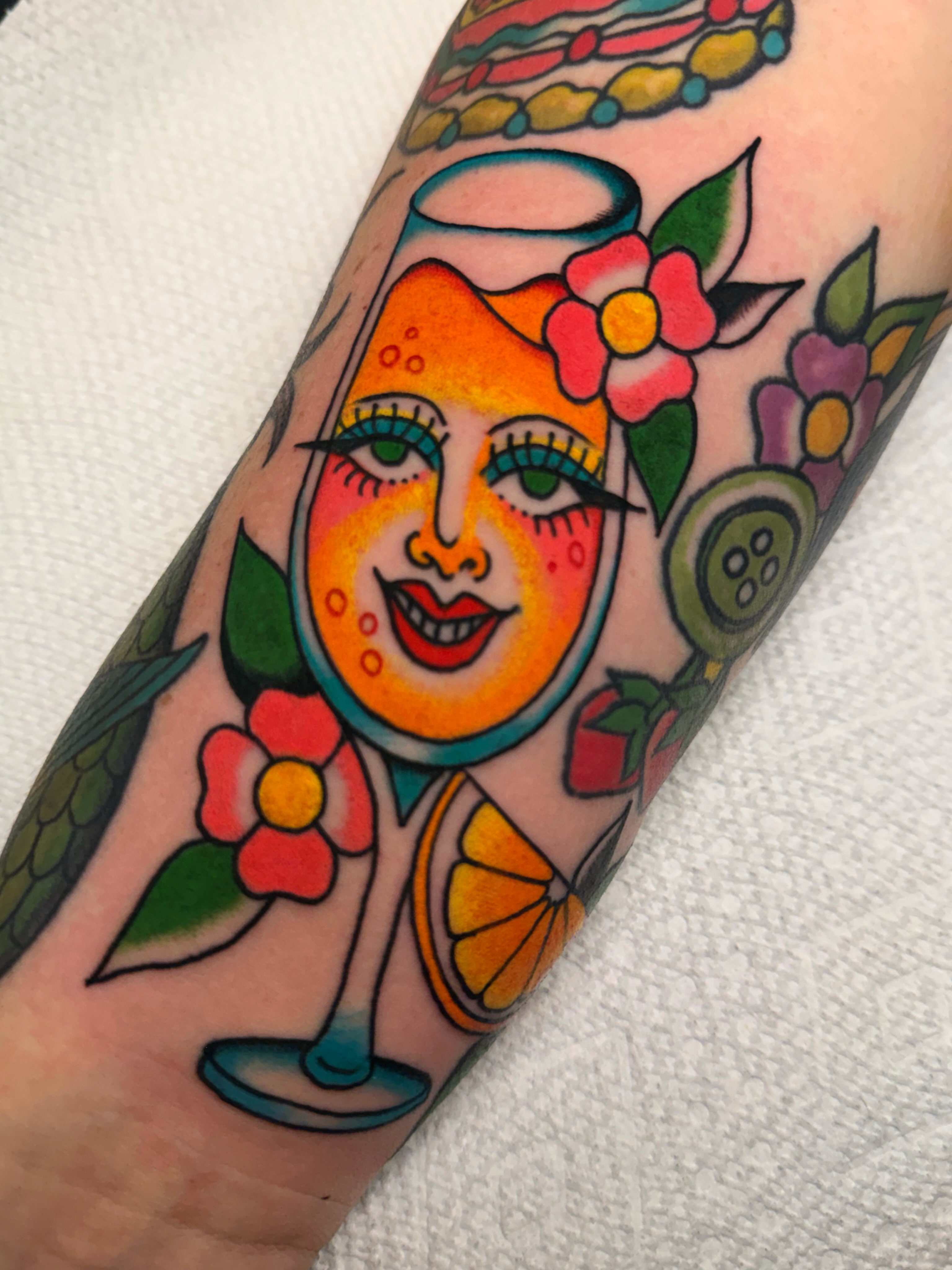 Margarita glass with woman's face American traditional tattoo on the forearm by ⭐️ Erin Bauer ⭐️