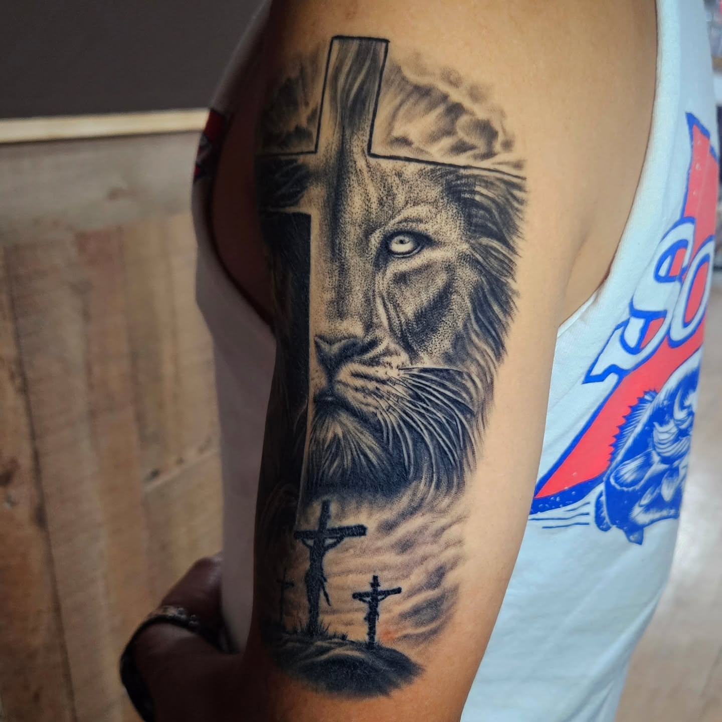 Lion dotwork tattoo on the forearm by Isaac Morales