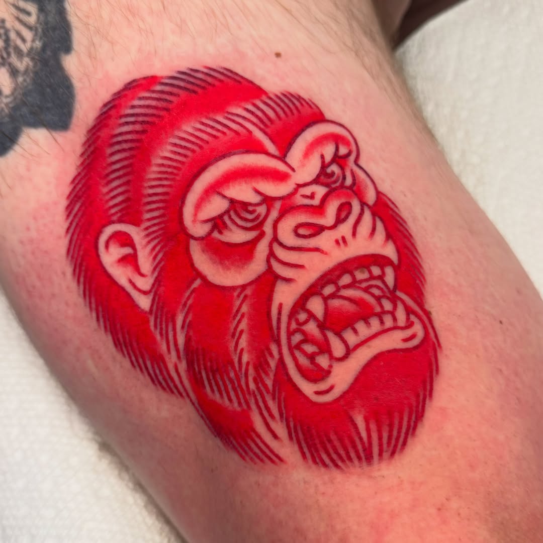 Angry gorilla American traditional tattoo on the forearm by Larry Love