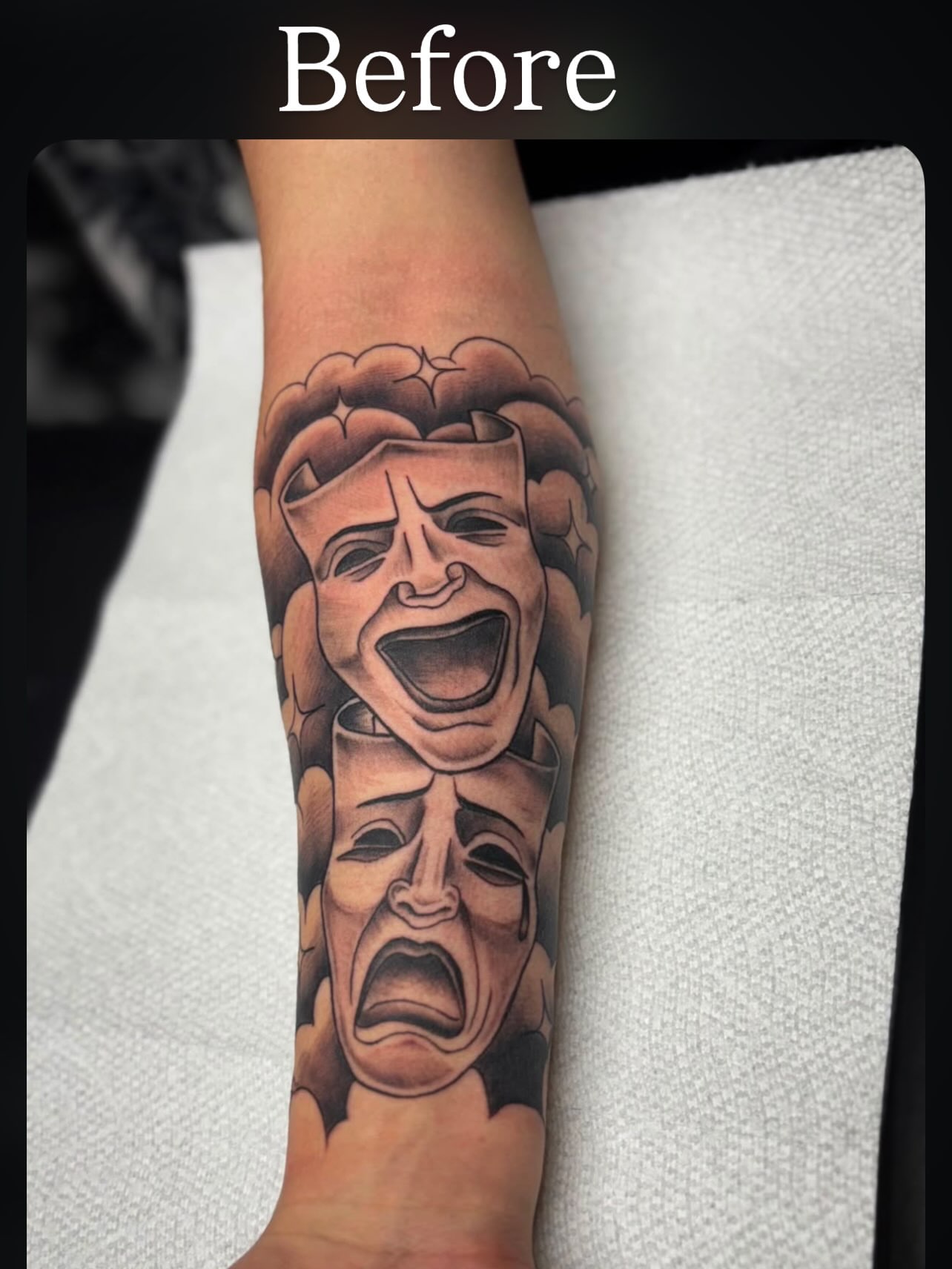 Theatrical masks realism tattoo on the forearm by Chris Torres