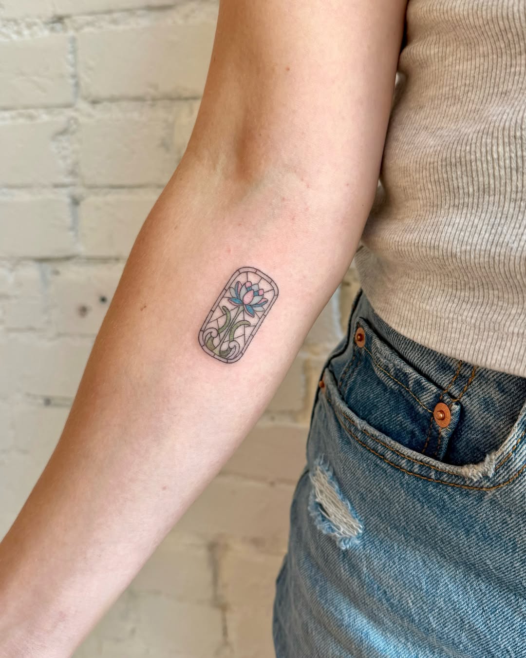 Lotus flower fine line tattoo on the forearm by Shilo Gold 🍒