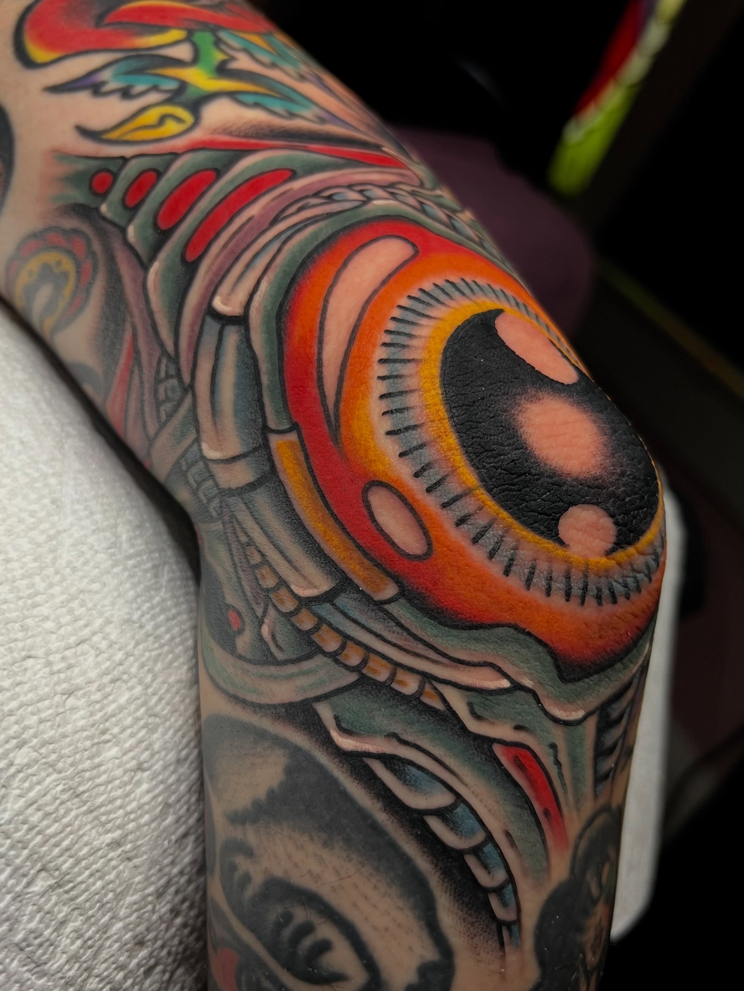 Cyborg eye American traditional tattoo on the forearm by ᴍᴀᴛᴛ ᴀʟᴇxᴀɴᴅᴇʀ
