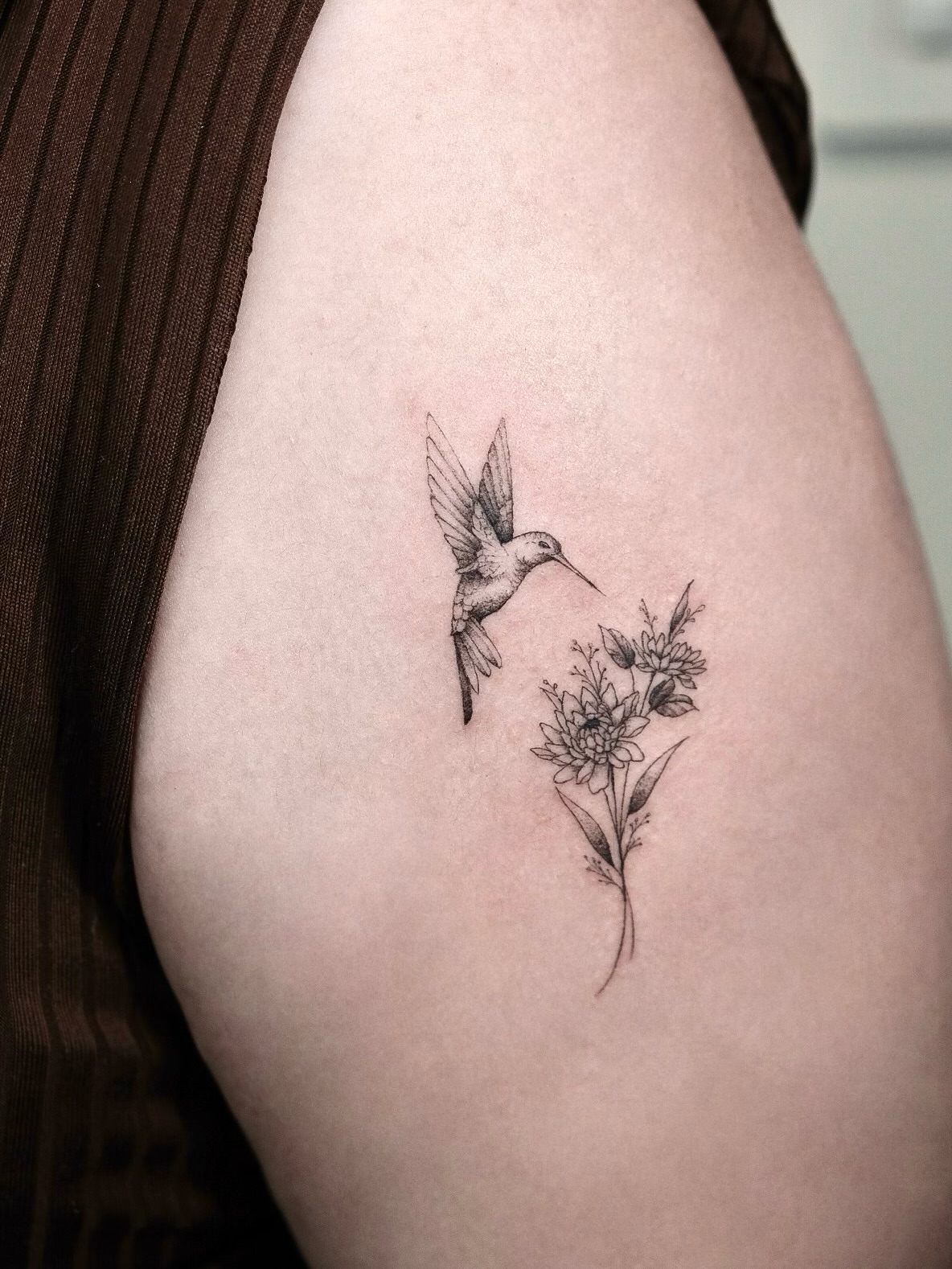 Hummingbird and flowers realism tattoo on the shoulder by Your tattoo Artist, New York, New York