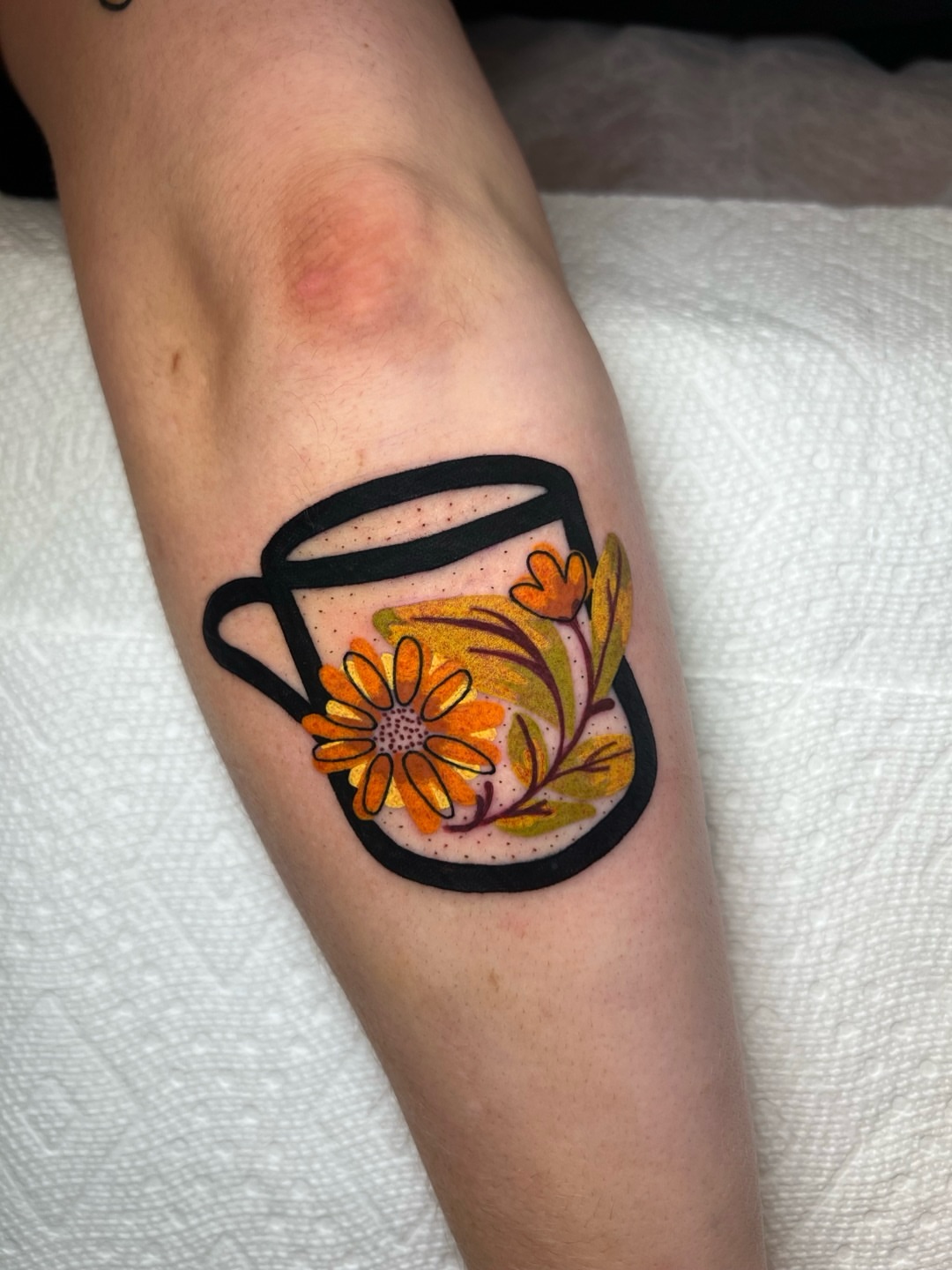 Coffee mug with flowers dotwork tattoo on the forearm by Tattoo Artist