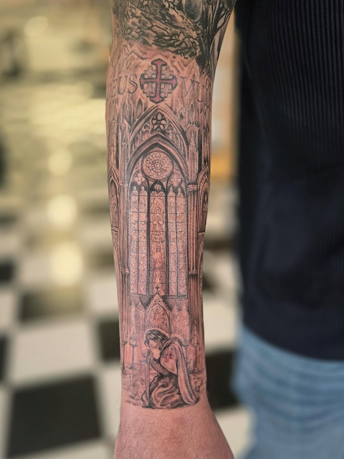 Gothic cathedral realism tattoo on the forearm by Molly DeSmedt