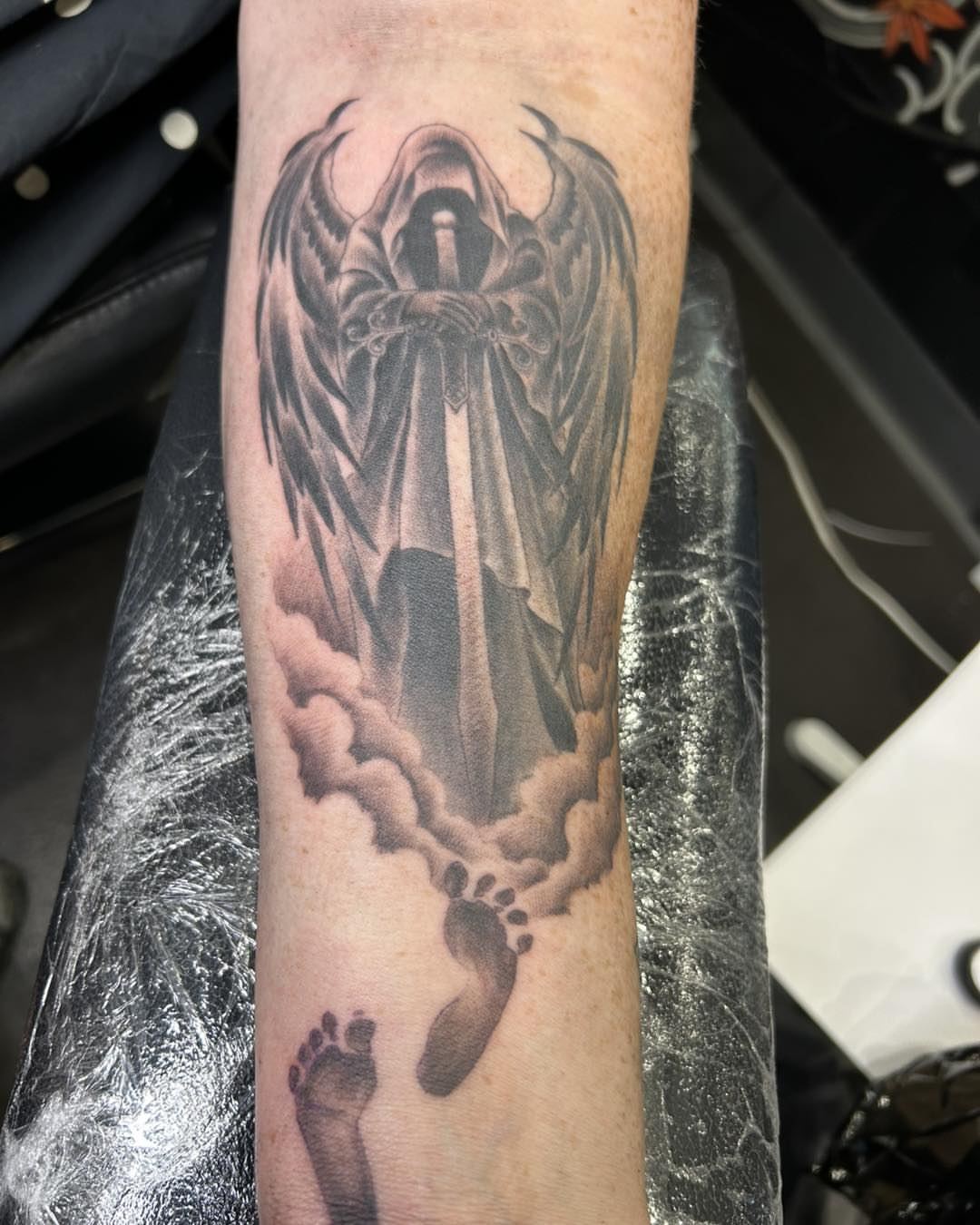 Tattoo by @darren_room5_spencer — black_and_grey, realism