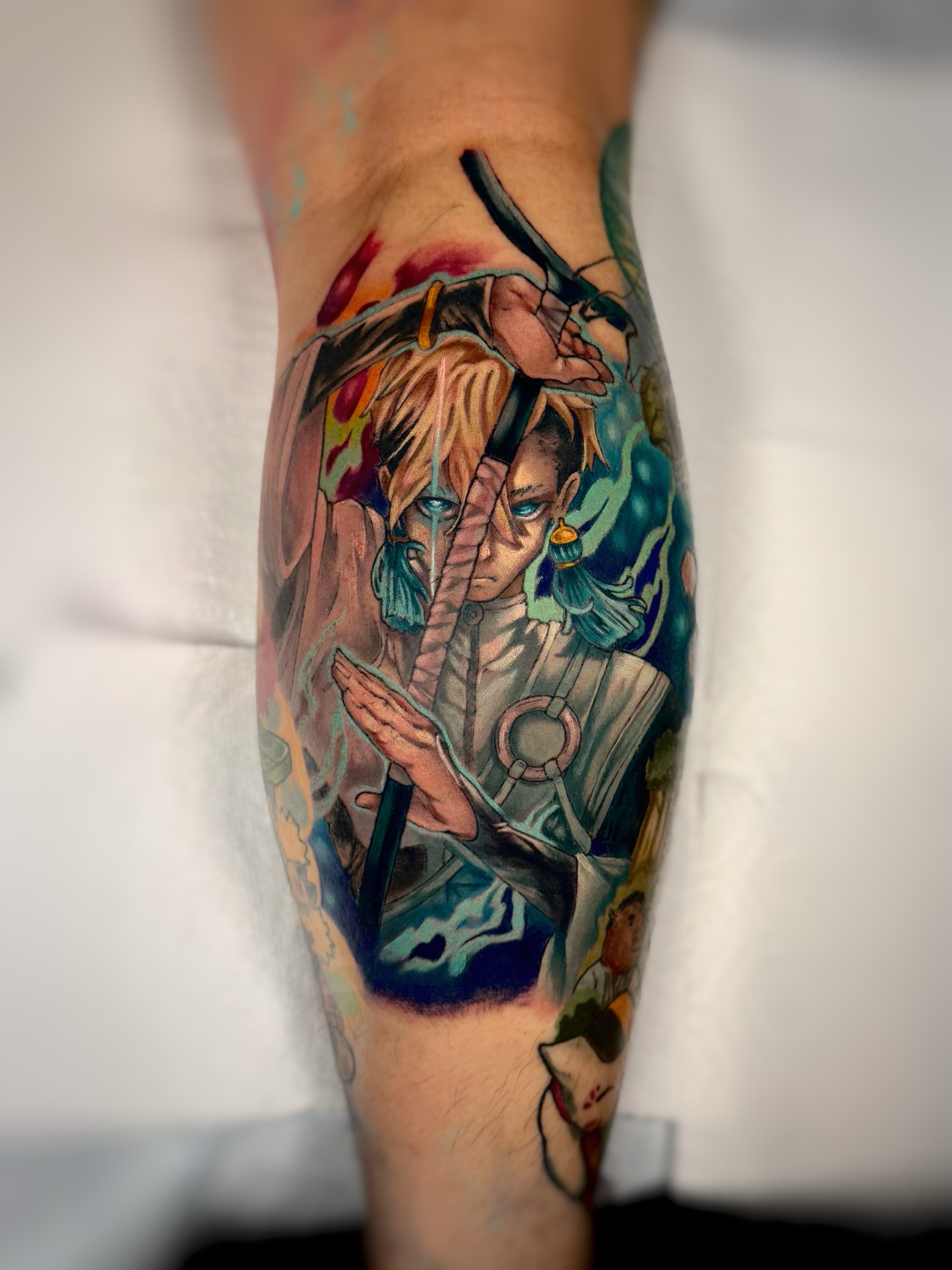 Anime characters anime tattoo on the forearm by Anna Saveria