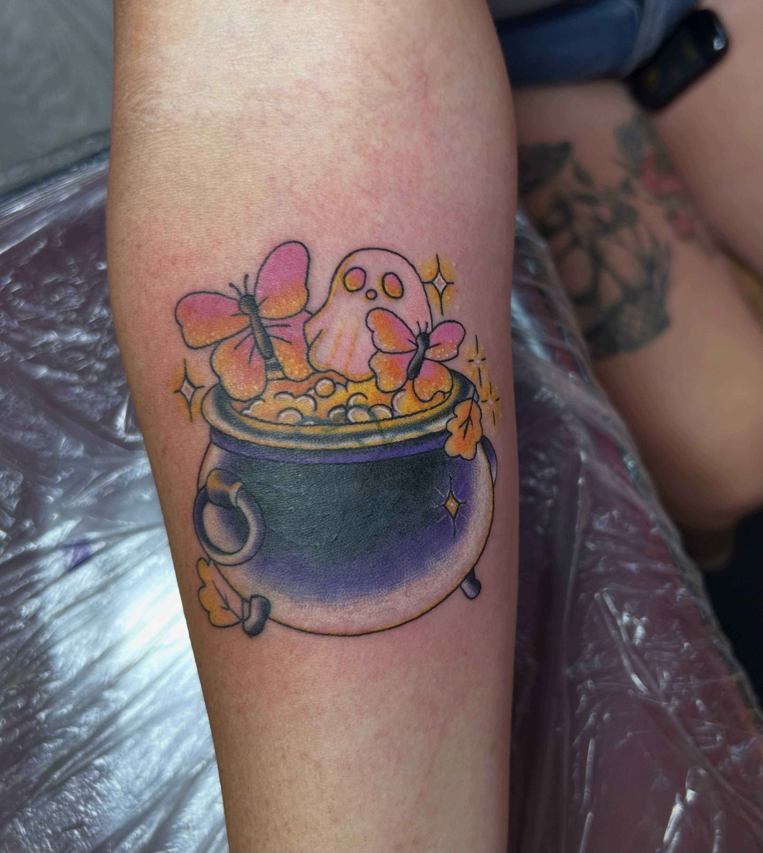 Ghost in cauldron new school tattoo on the forearm by Red✨, Gansevoort, New York